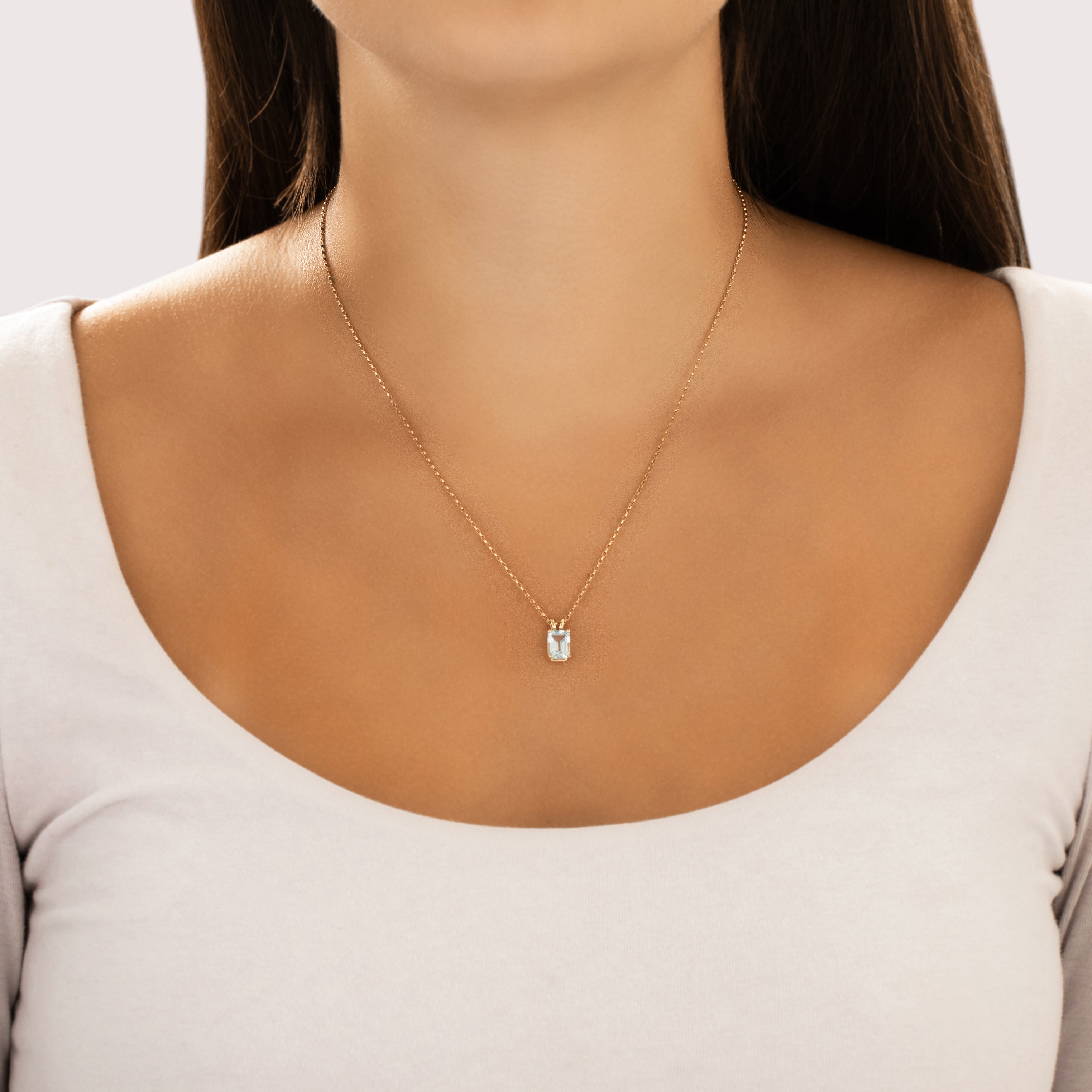 Vintage Small 14k Yellow Gold 1.57ct Light Blue Topaz Flashing Pool Pendant - On model view