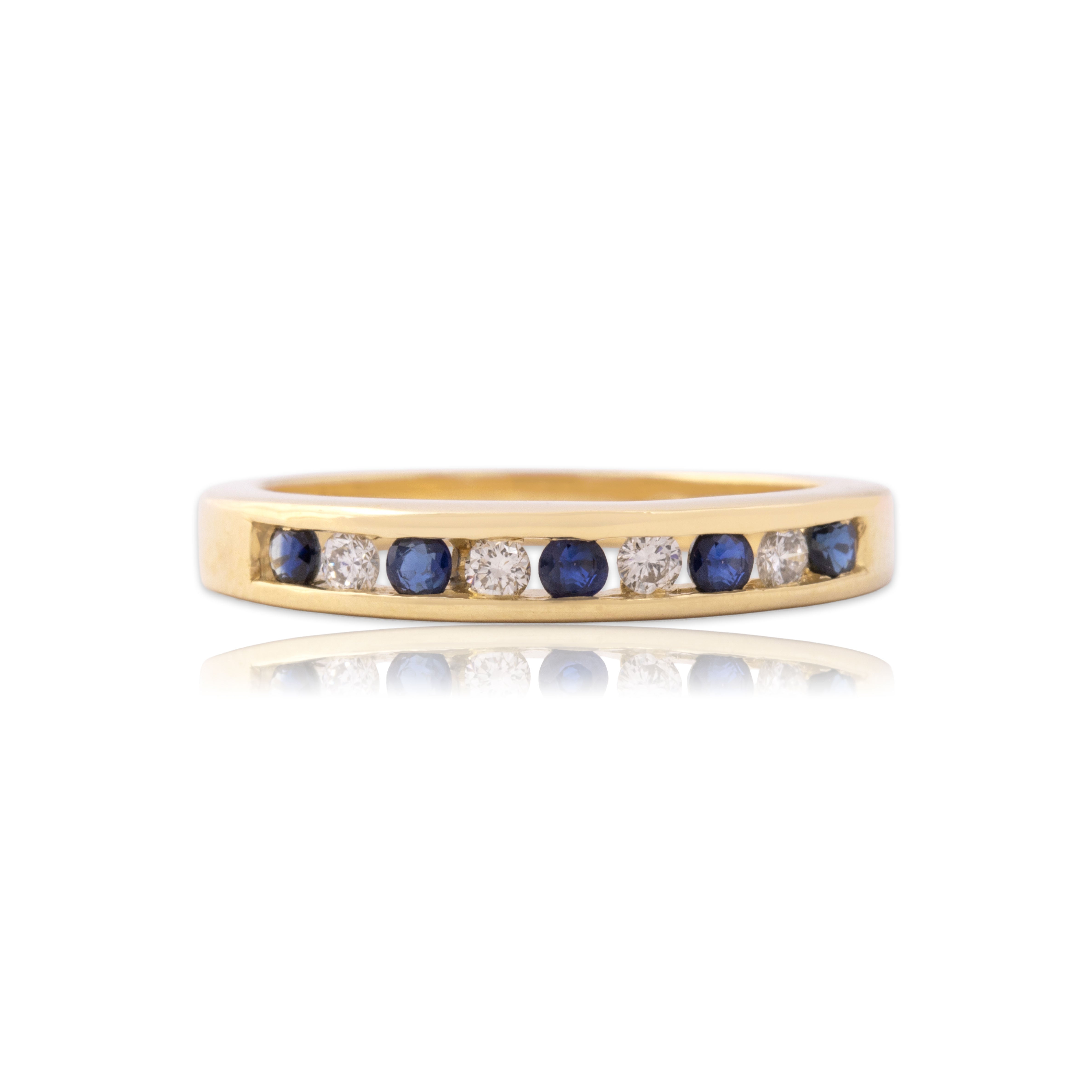 Vintage 14k Yellow Gold Blue Sapphire Diamond Classic Channel Band Ring - Close-up view
