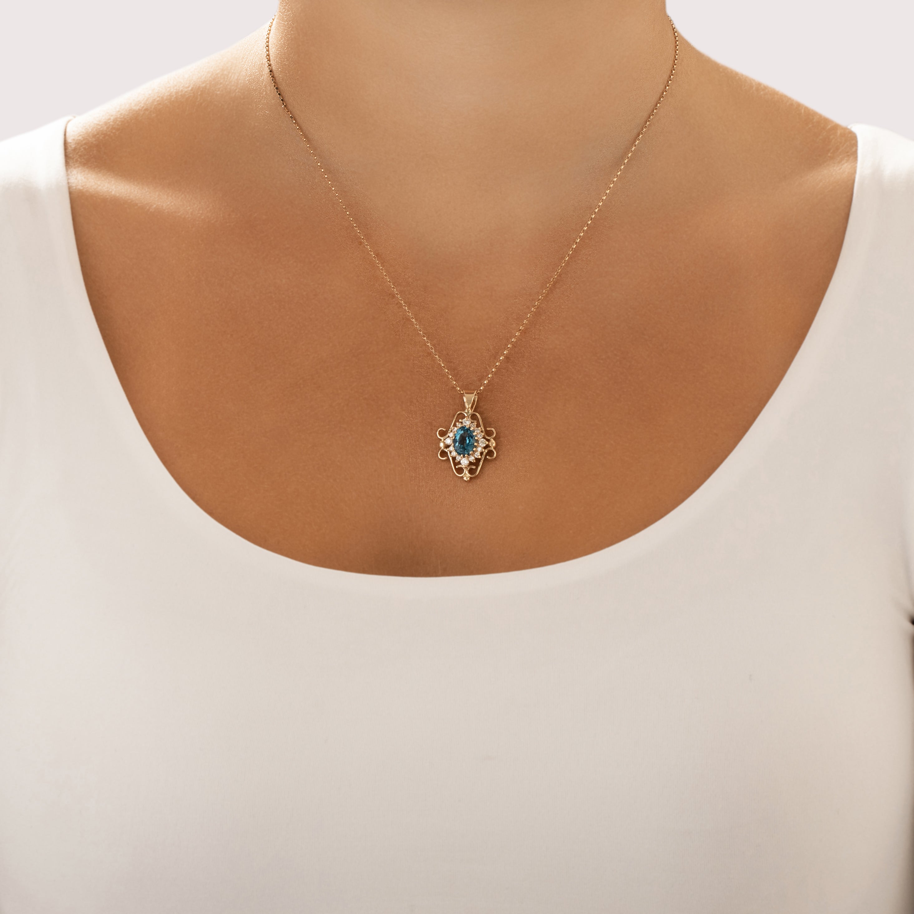 Vintage 14k Yellow Gold 1.92ct Blue Topaz Diamond Striking Scrolling Oval Halo Pendant - On model view