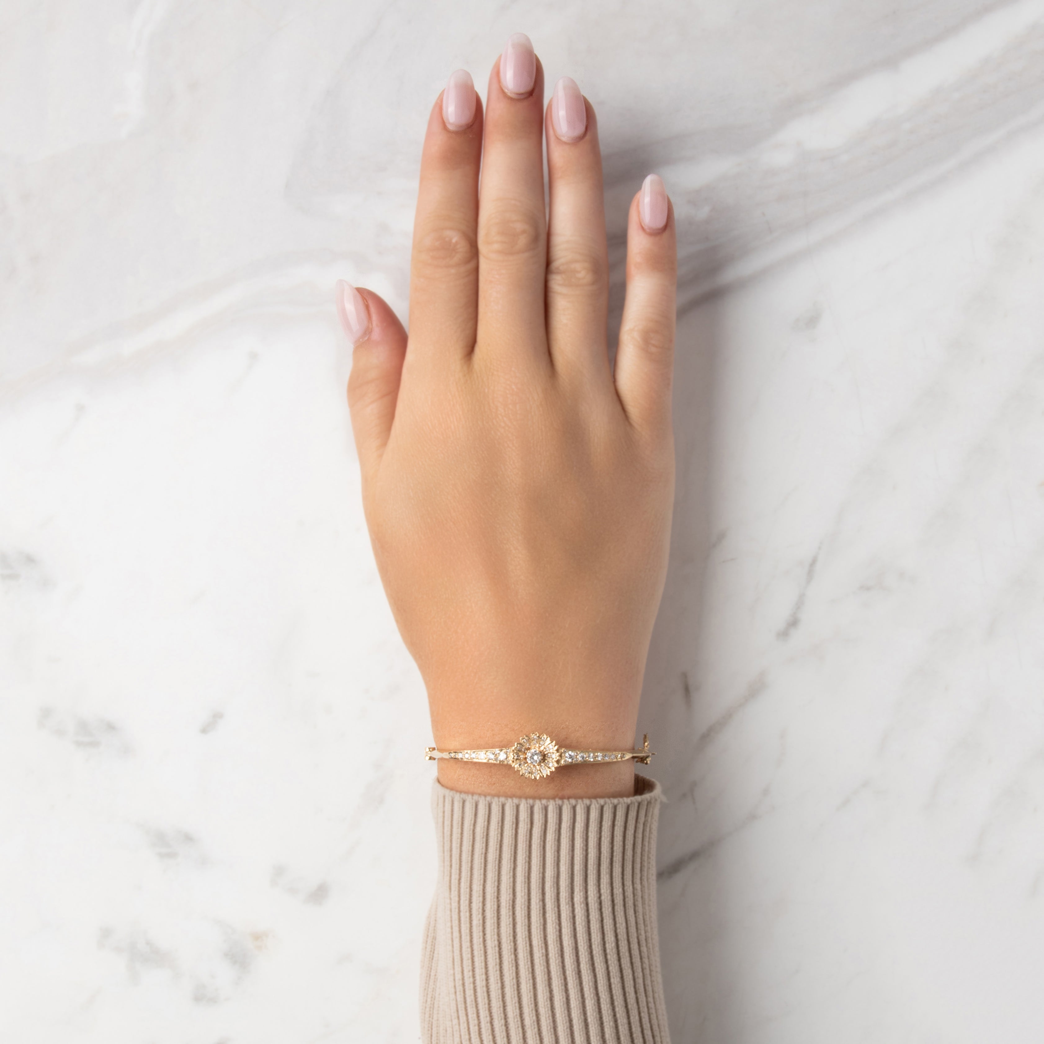 Vintage 14k Yellow Gold .71cttw Diamond Glittering Daisy Bangle Bracelet - On model view