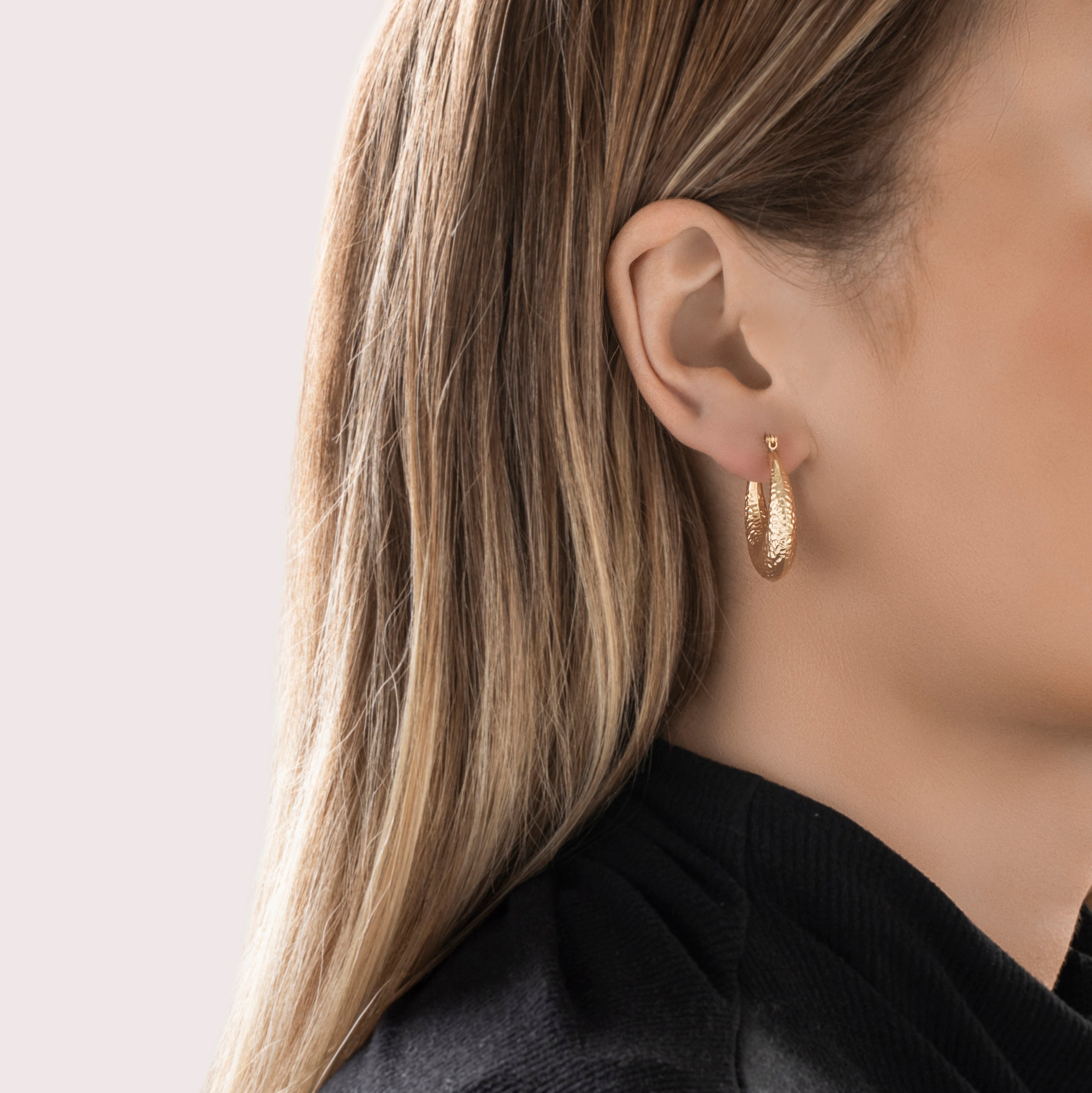 Vintage 14k Yellow Gold Gleaming Textured Oblong Hoop Earrings - On model view