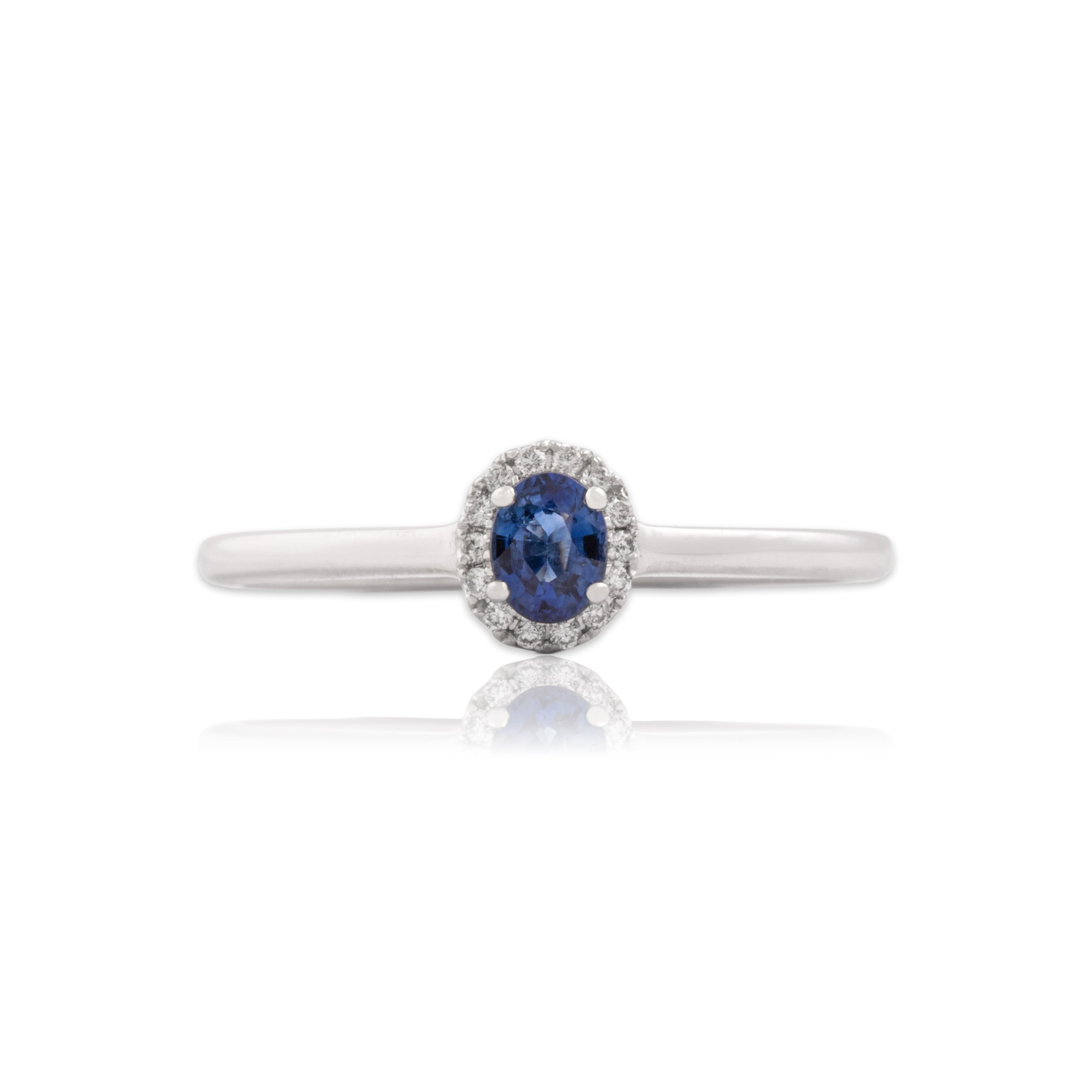 Estate 14k White Gold Blue Sapphire Diamond Gleaming Dainty Halo Ring - Close-up view