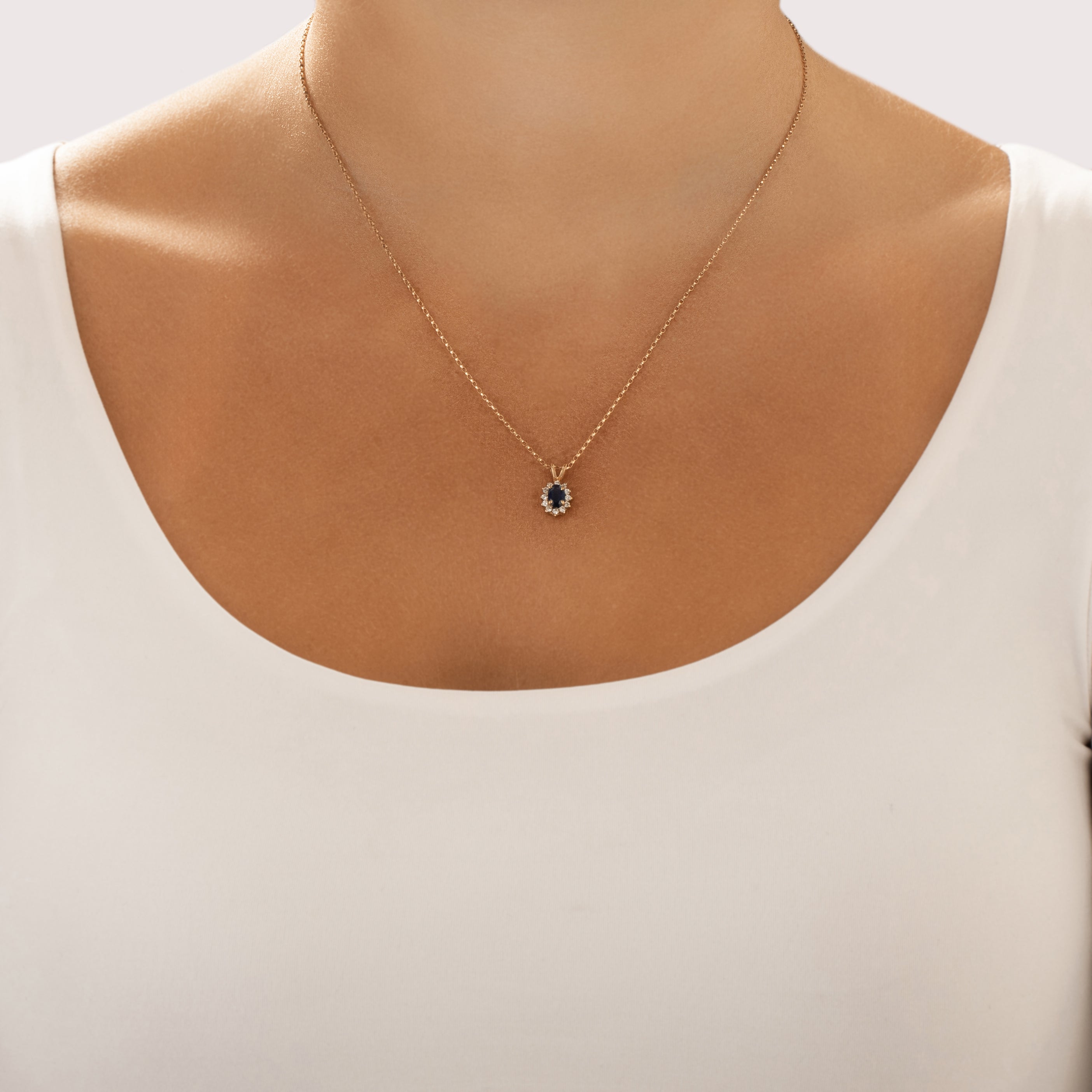 Vintage Small 14k Yellow Gold .5ct Blue Sapphire Diamond Classic Oval Halo Pendant - On model view