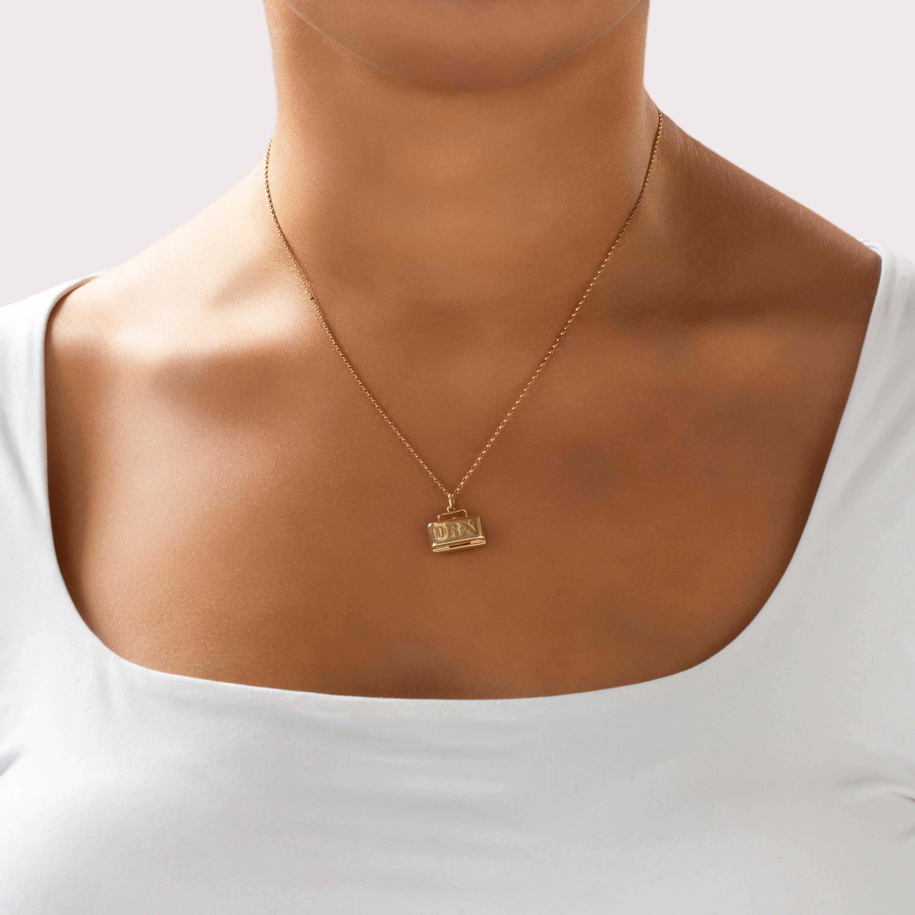 Vintage 14k Yellow Gold Opening Dr X Tool Bag Charm / Pendant - On model view