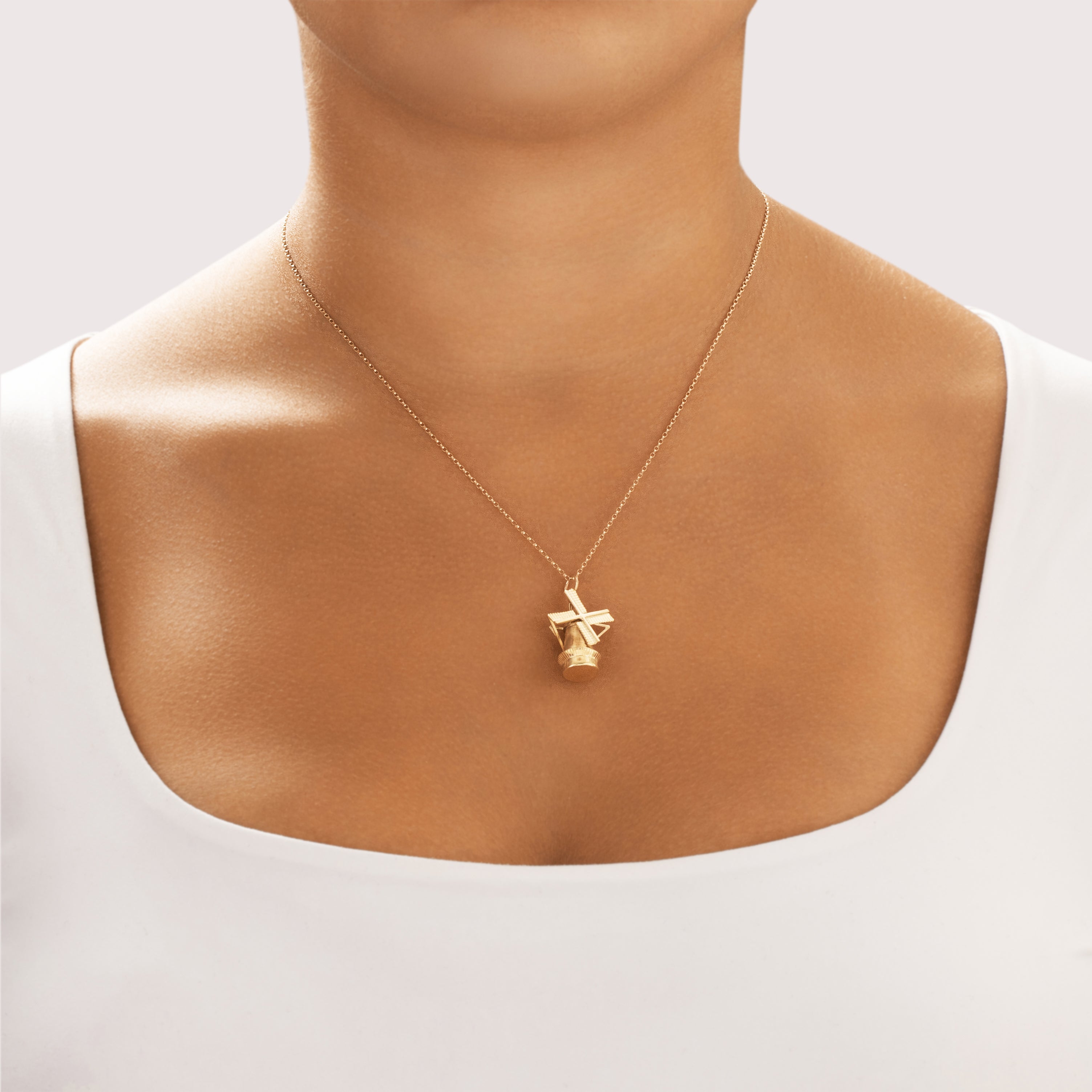 Vintage 14k Yellow Gold Articulated Textured Spinning Windmill Charm / Pendant - On model view