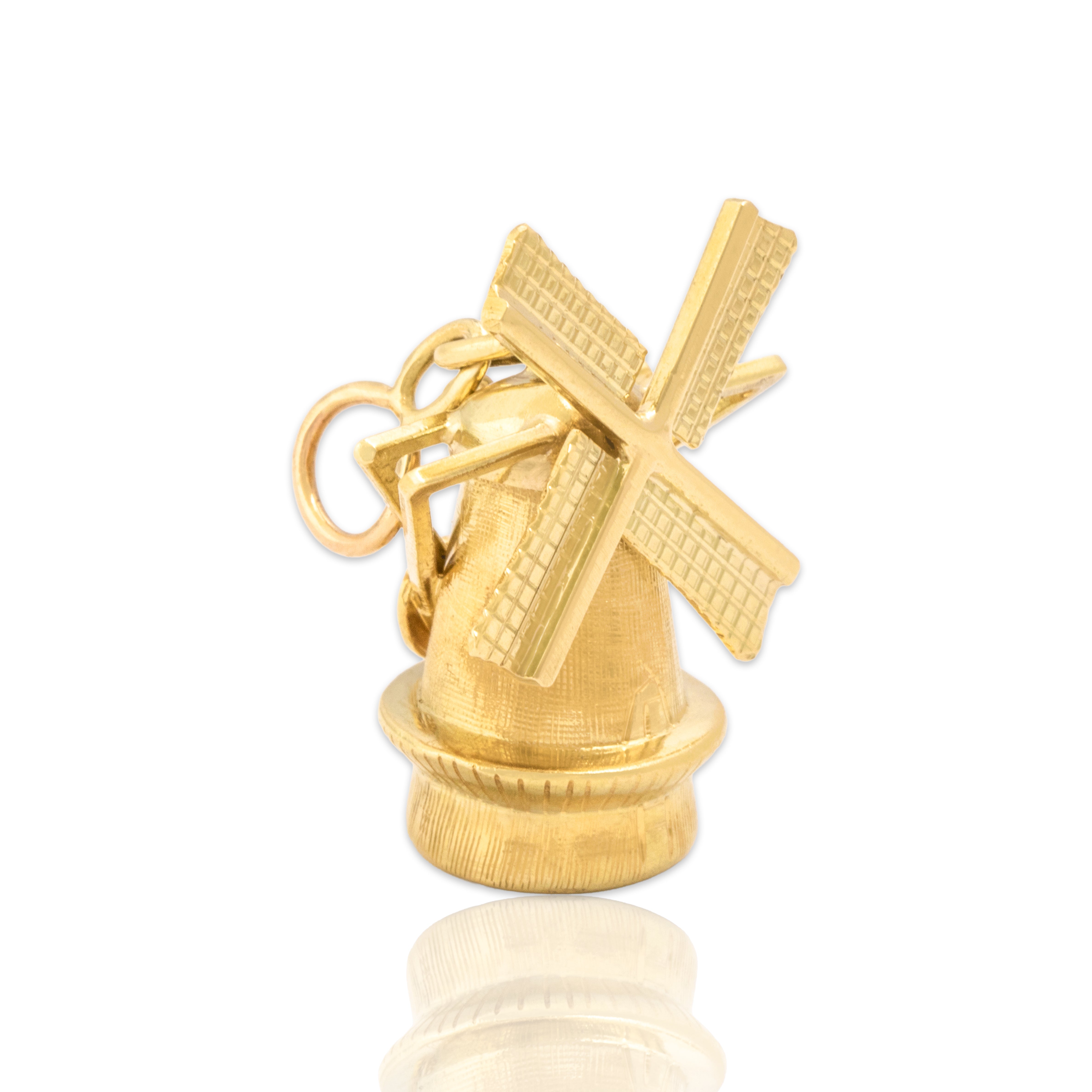 Vintage 14k Yellow Gold Articulated Textured Spinning Windmill Charm / Pendant - Close-up view