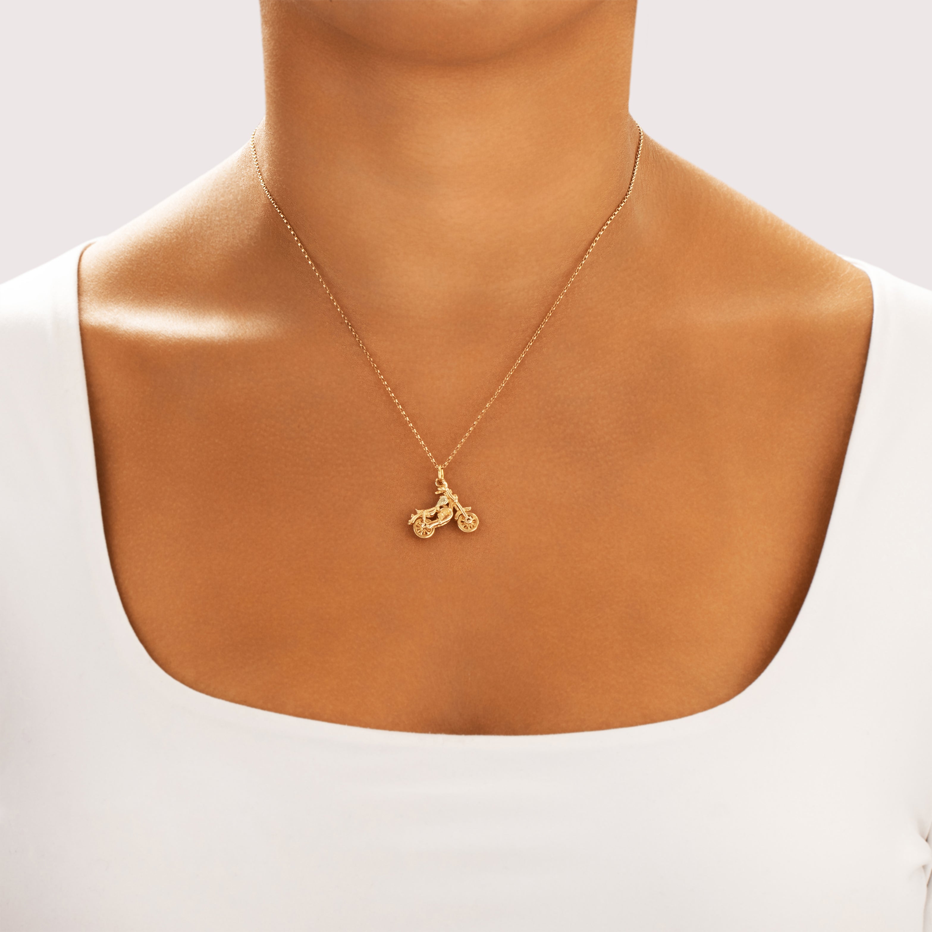Vintage 12k Yellow Gold Cruising Articulated Motorcycle Charm / Pendant - On model view