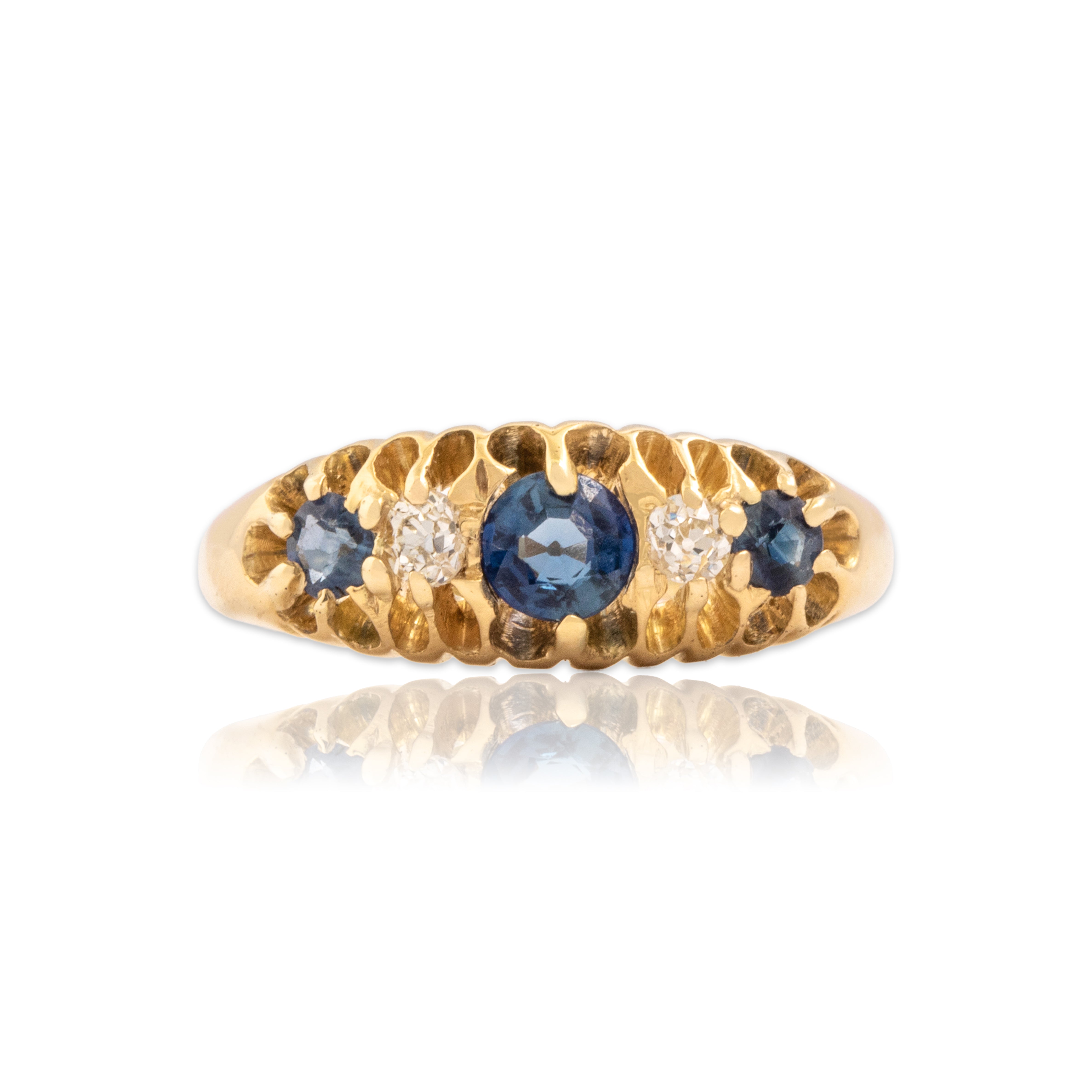 Antique Victorian English 18k Yellow Gold Blue Synthetic Sapphire Natural Old Mine Cut Diamond Sparkling Multi-Prong Line Ring - Close-up view