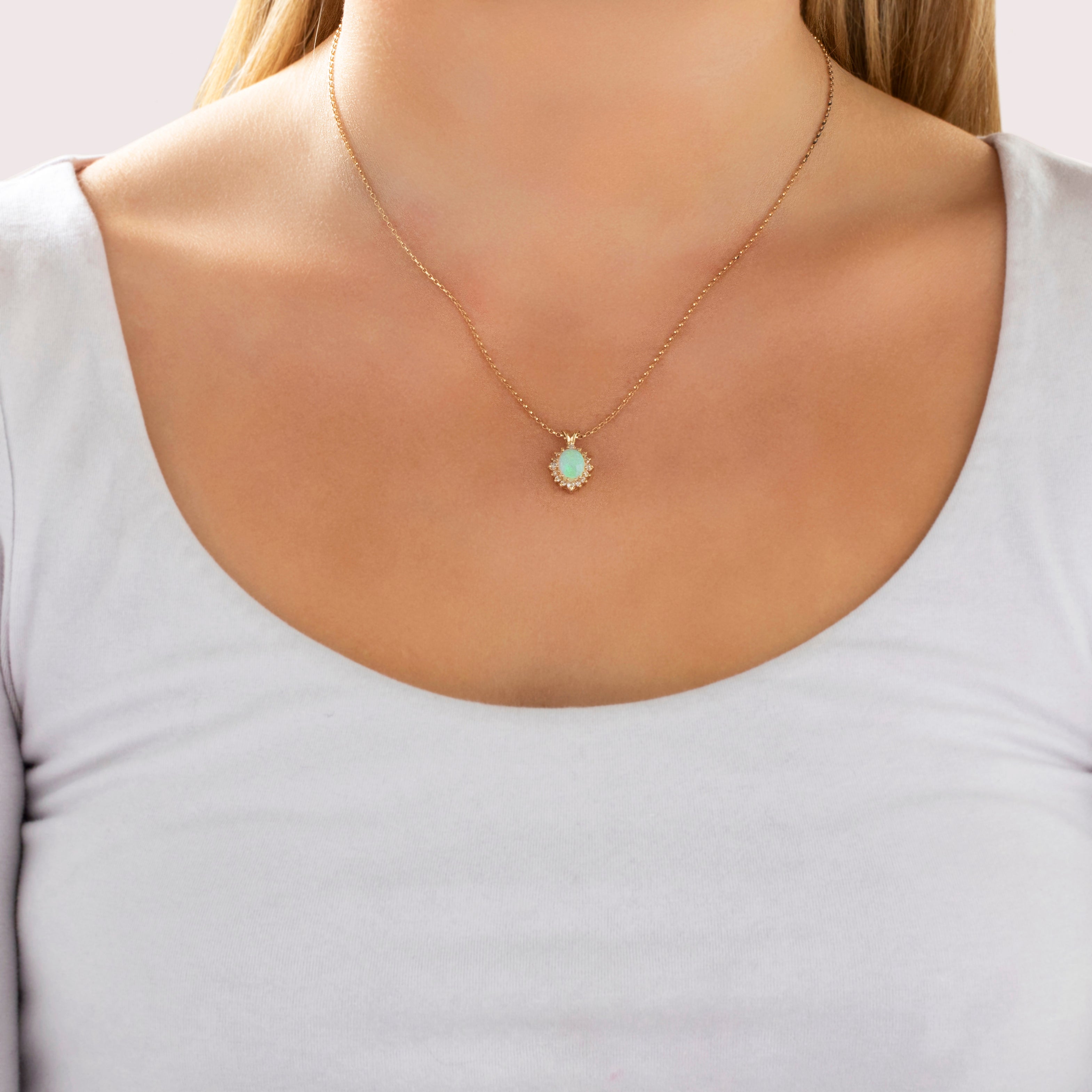 Vintage 14k Yellow Gold 1.12ct Opal Diamond Sparkling Oval Halo Pendant - On model view