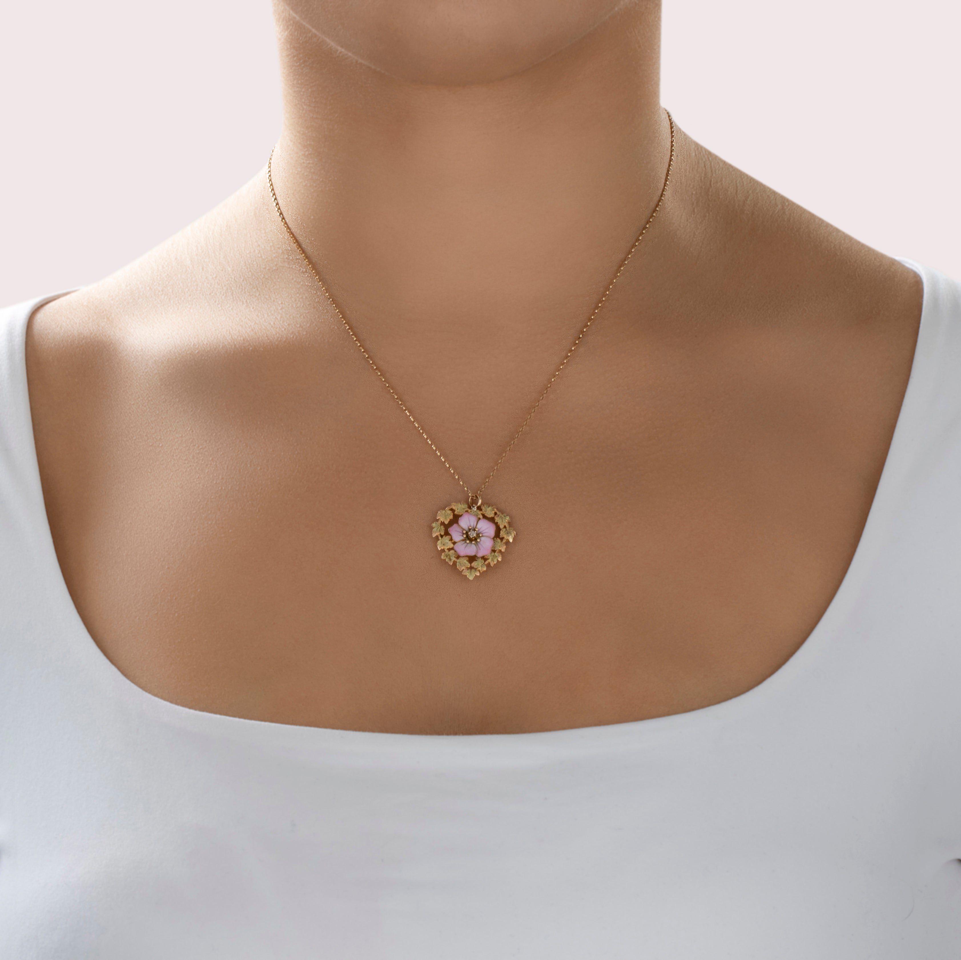 Antique Victorian 14k Yellow & Rosy Yellow Gold Old Mine Cut Diamond Pink Enamel Floral Heart Wreath Pendant - On model view