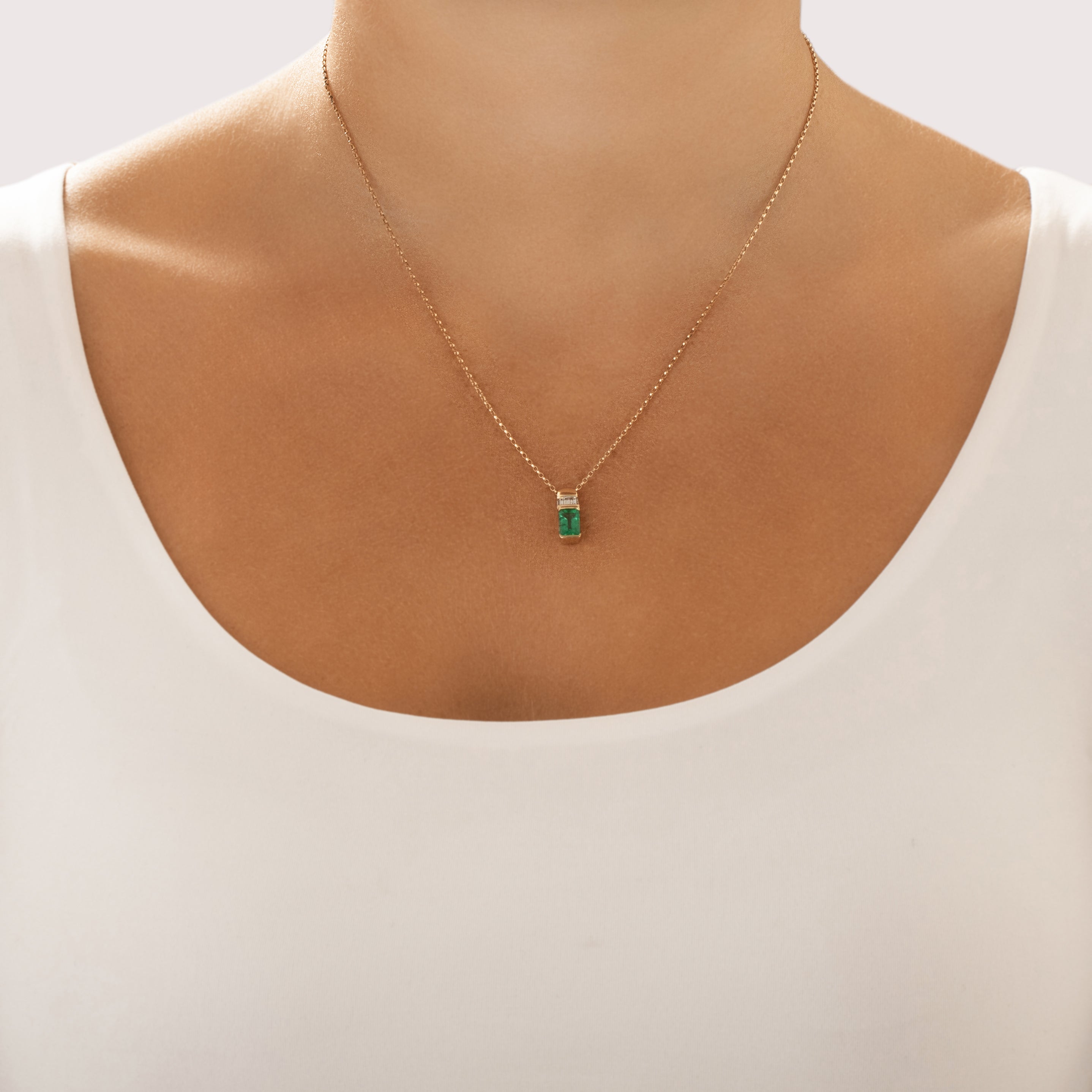 Vintage 14k Yellow Gold .86ct Emerald Diamond Elegant Baguette Accented Pendant - On model view