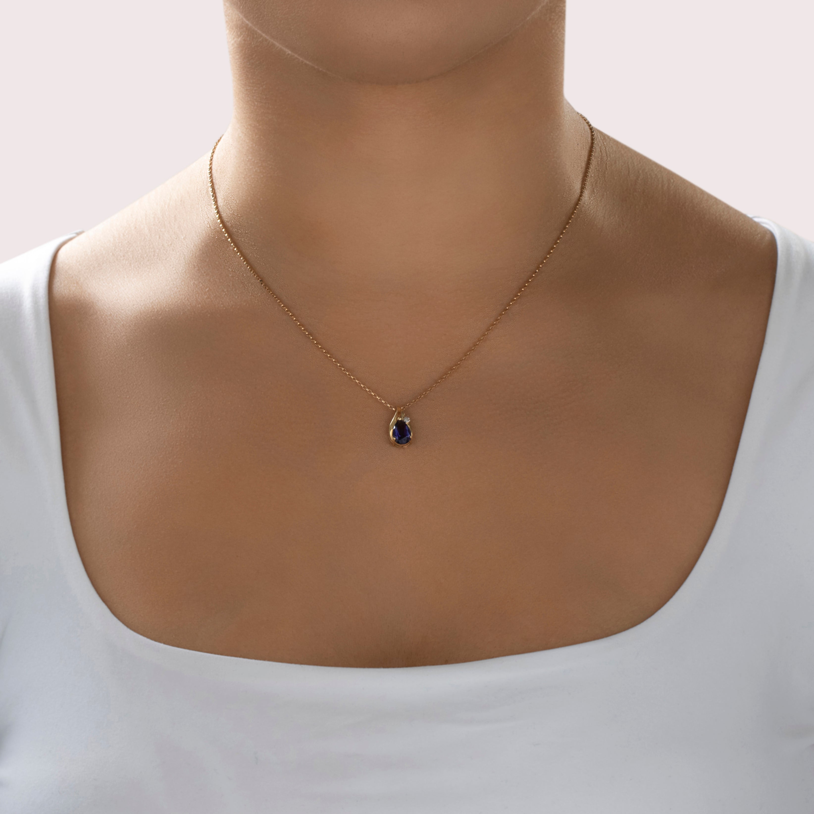 Vintage 14k Yellow Gold 1.05ct Iolite Diamond Accented Purple Pear Pendant - On model view