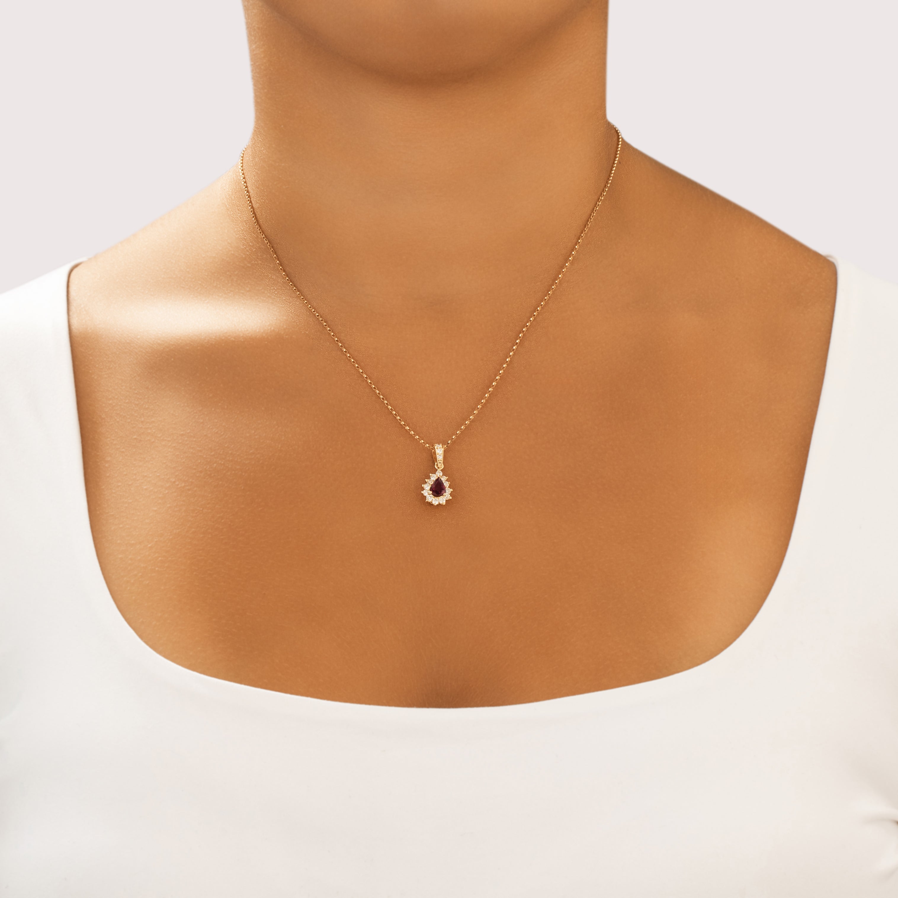 Vintage 14k Yellow Gold .52ct Ruby Diamond Sparkling Pear Halo Dangle Pendant - On model view