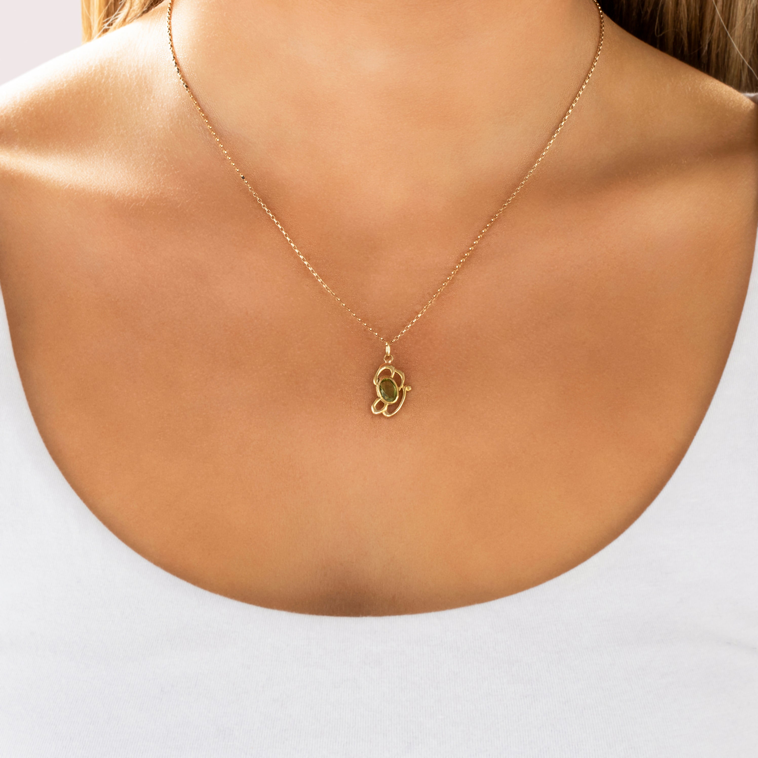 Antique 14k Yellow Gold 1.04ct Peridot Artistic Scrolling Oval-Cut Charm / Pendant - On model view