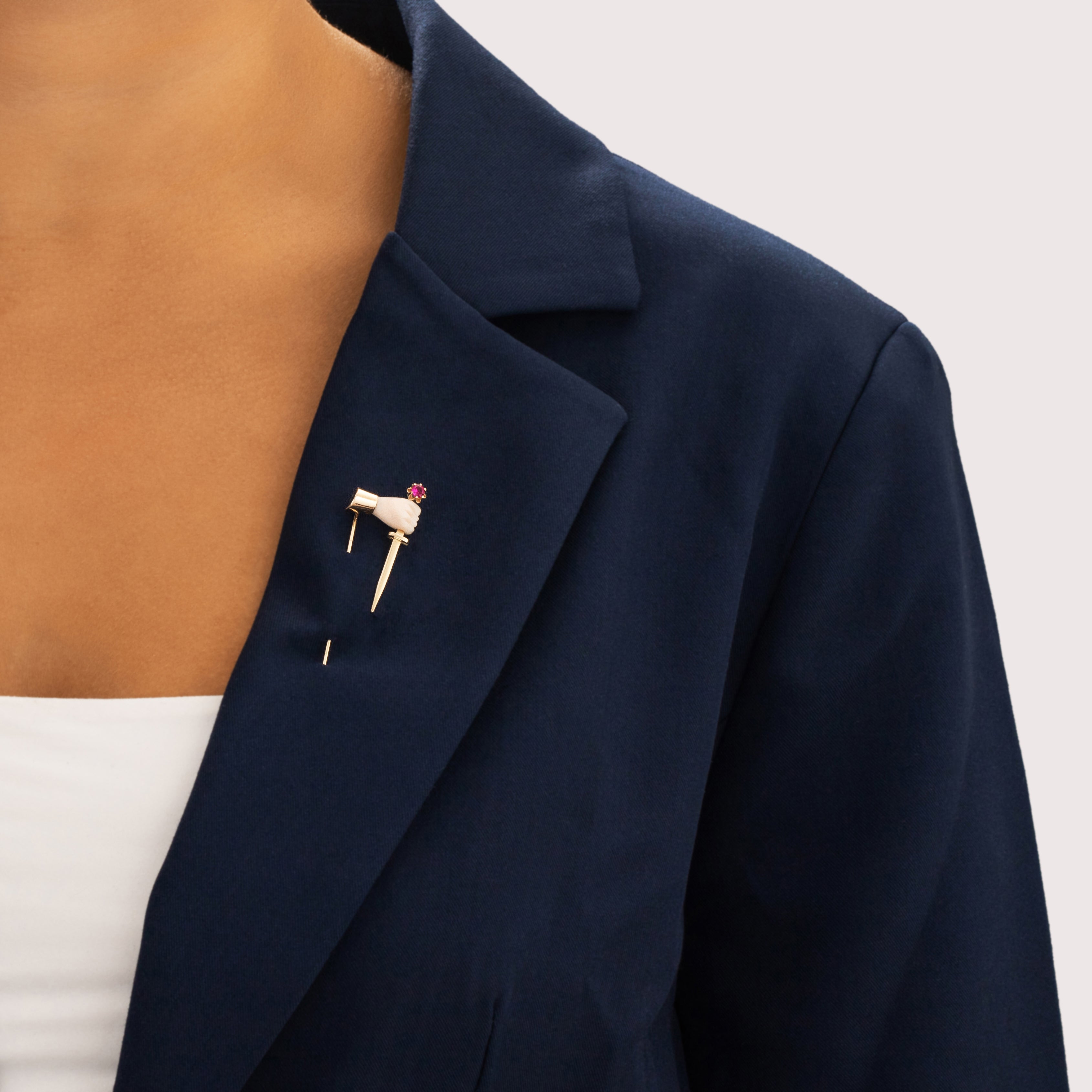 Antique 14k Yellow Gold & 10k Rosy Yellow Gold Natural Shell Synthetic Ruby Grasping Hand And Dagger Stick Pin - On model view