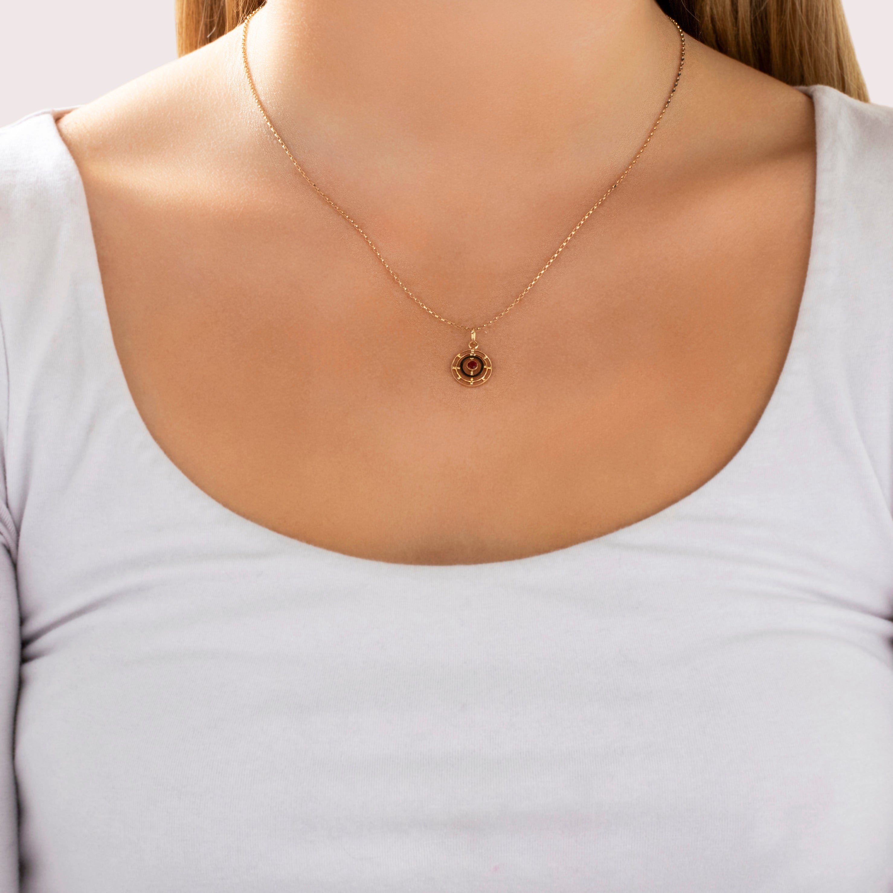 Antique Small 10k Yellow Gold Magenta Glass Black Enamel Orbital Charm / Pendant - On model view