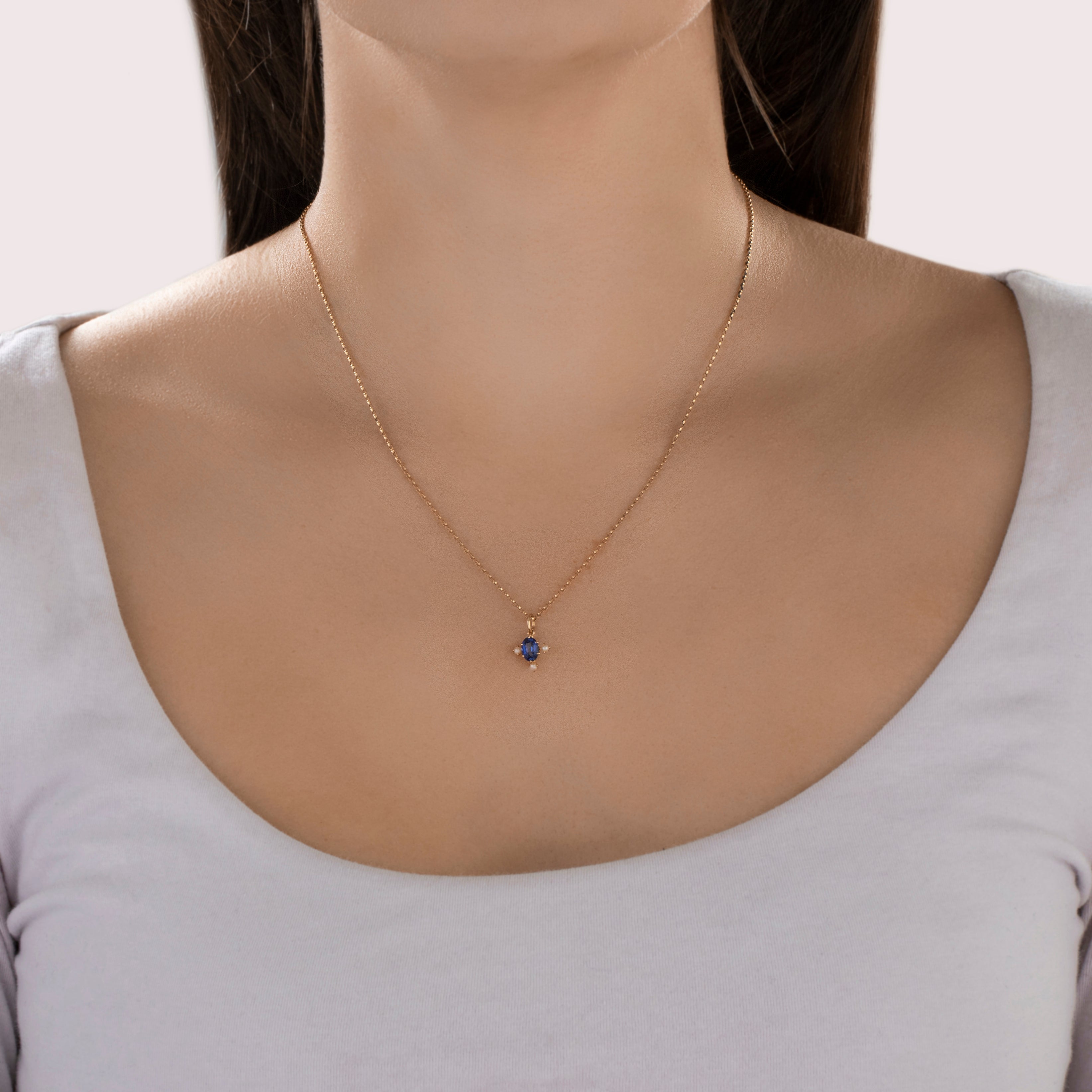 Antique 14k Yellow Gold .68ct Blue Synthetic Sapphire Oval Charm / Pendant - On model view