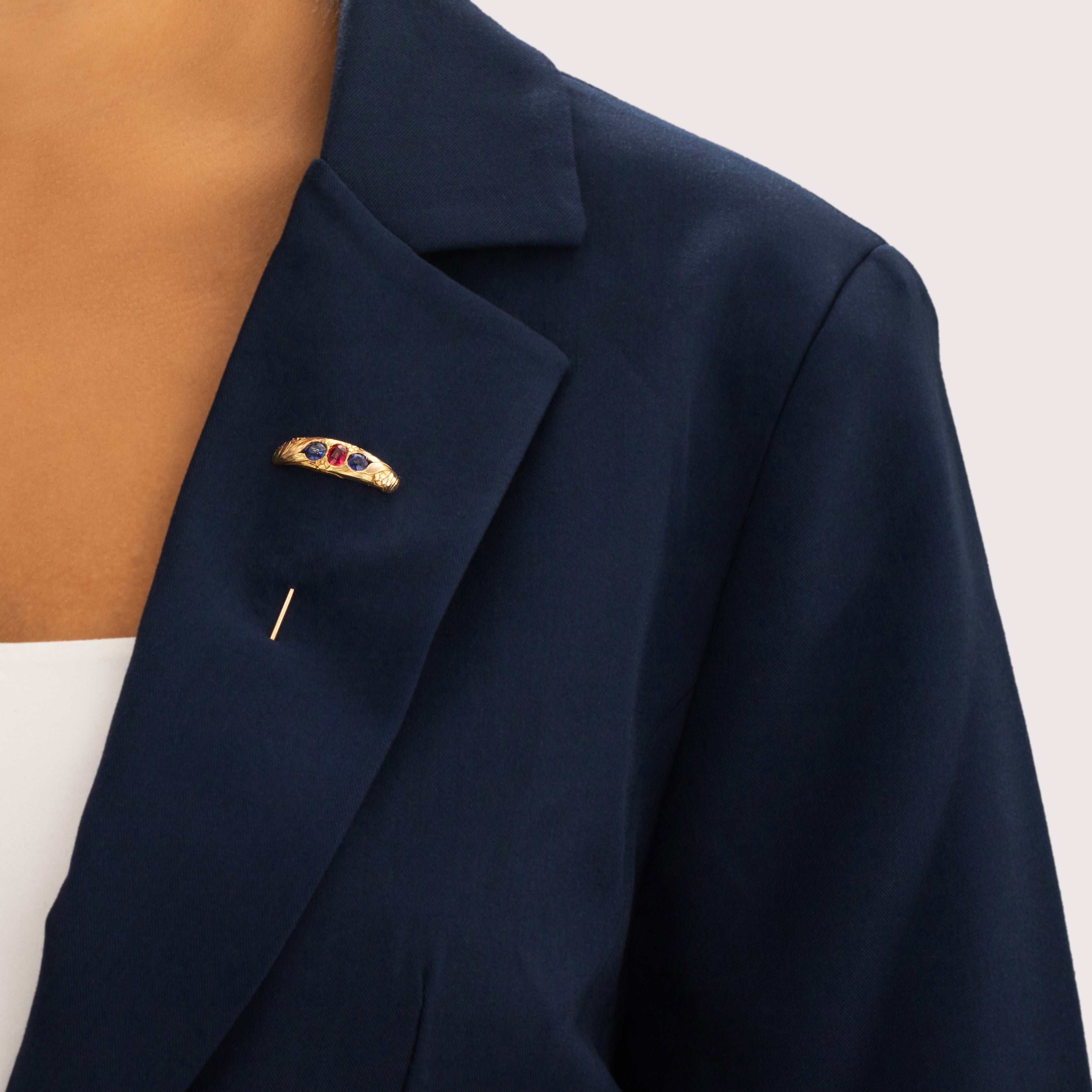 Antique 14k Yellow Gold .89cttw Blue Synthetic Sapphire Synthetic Ruby Glowing Engraved Floral Stick Pin - On model view