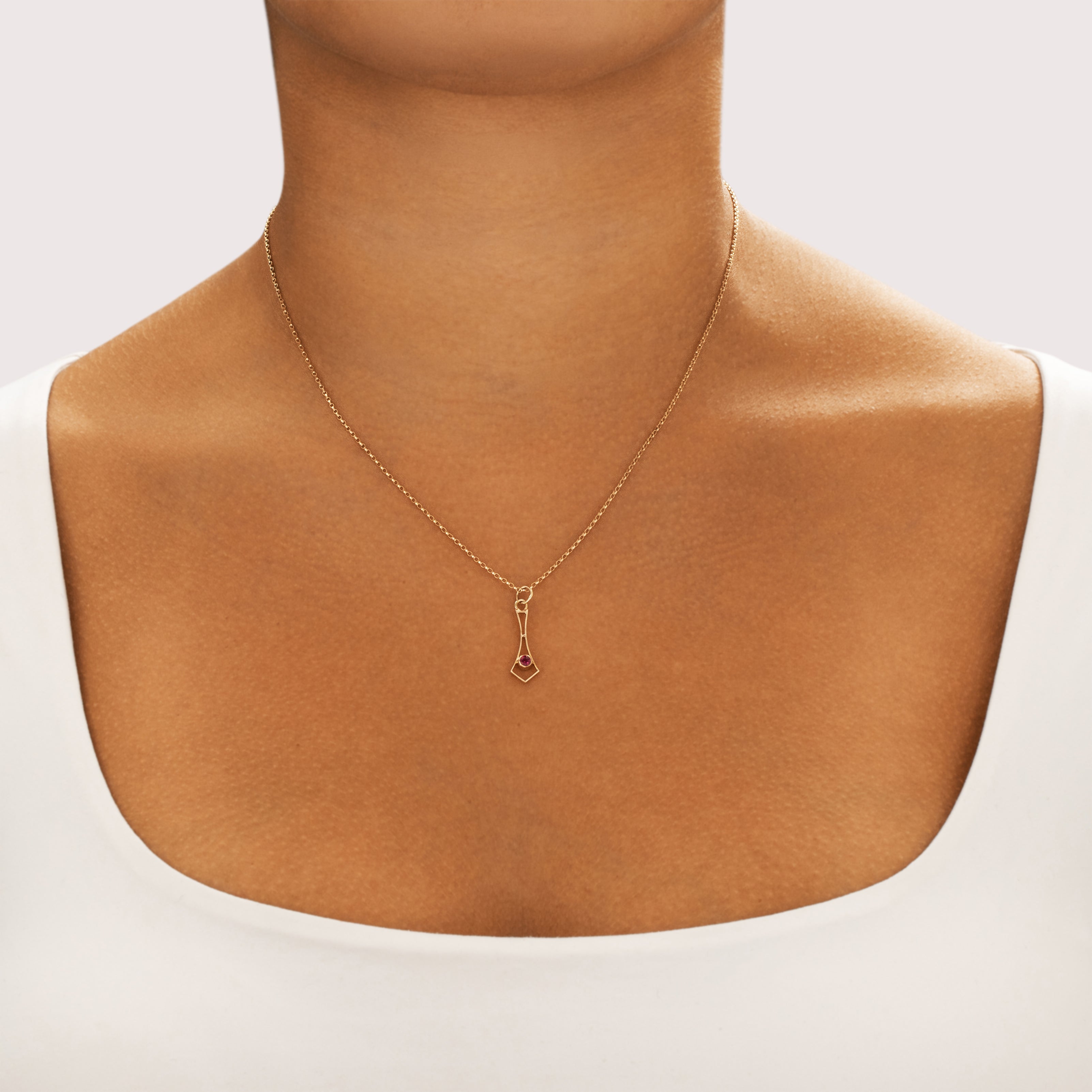 Antique Lightweight 10k Yellow Gold Synthetic Ruby Geometric Vibrant Solitaire Charm / Pendant - On model view