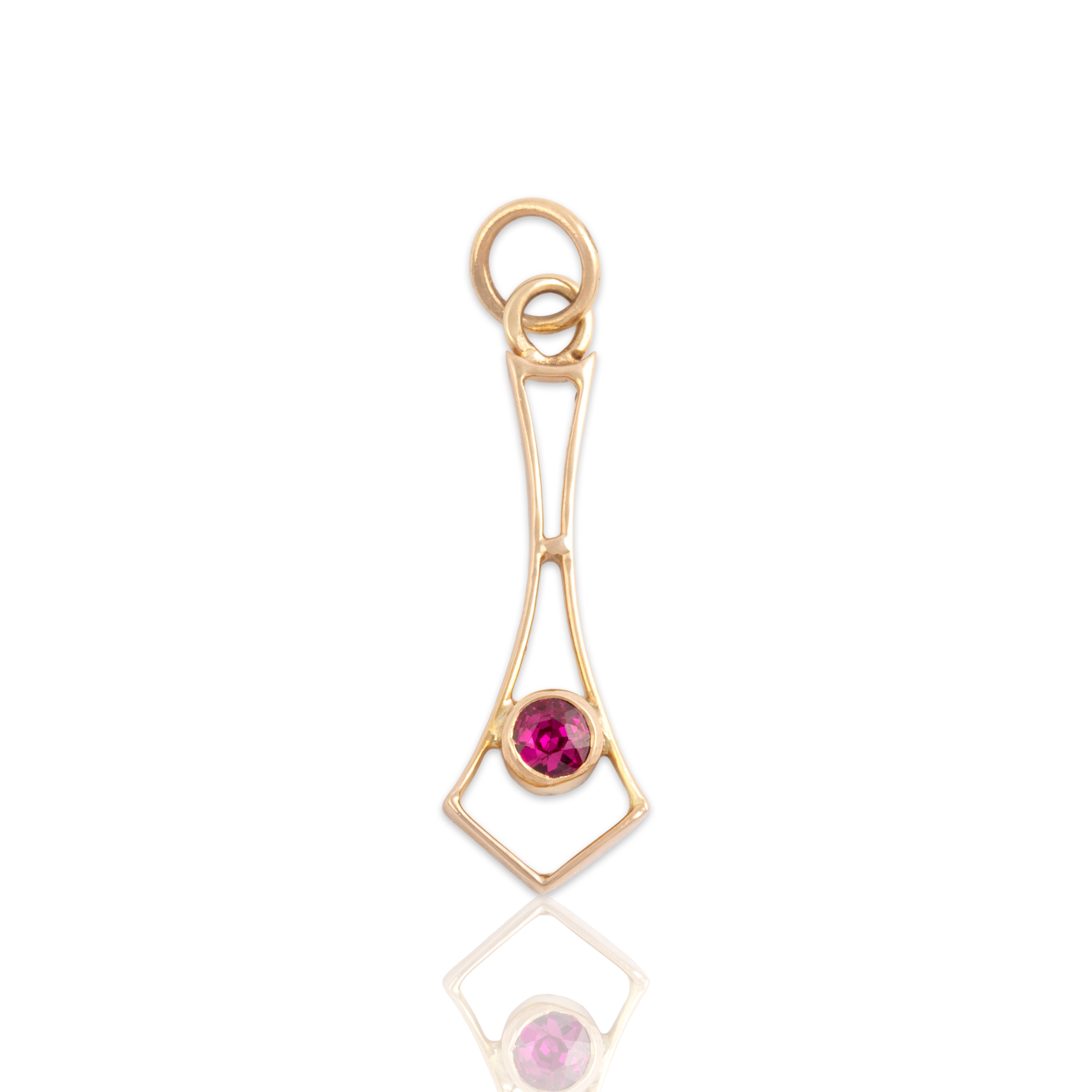 Antique Lightweight 10k Yellow Gold Synthetic Ruby Geometric Vibrant Solitaire Charm / Pendant - Close-up view