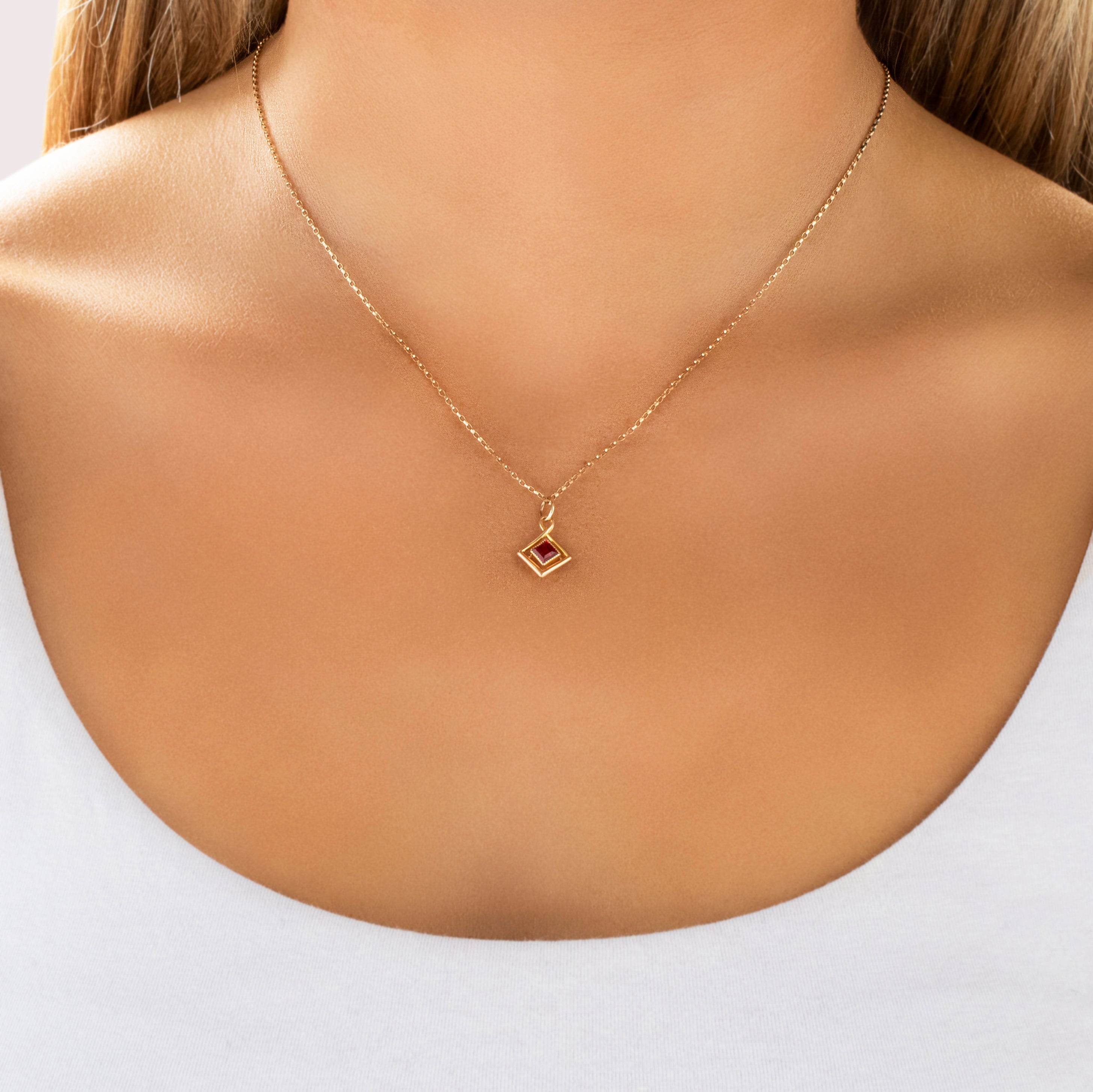 Antique 10k Yellow Gold Synthetic Ruby Crossover Square Charm / Pendant - On model view