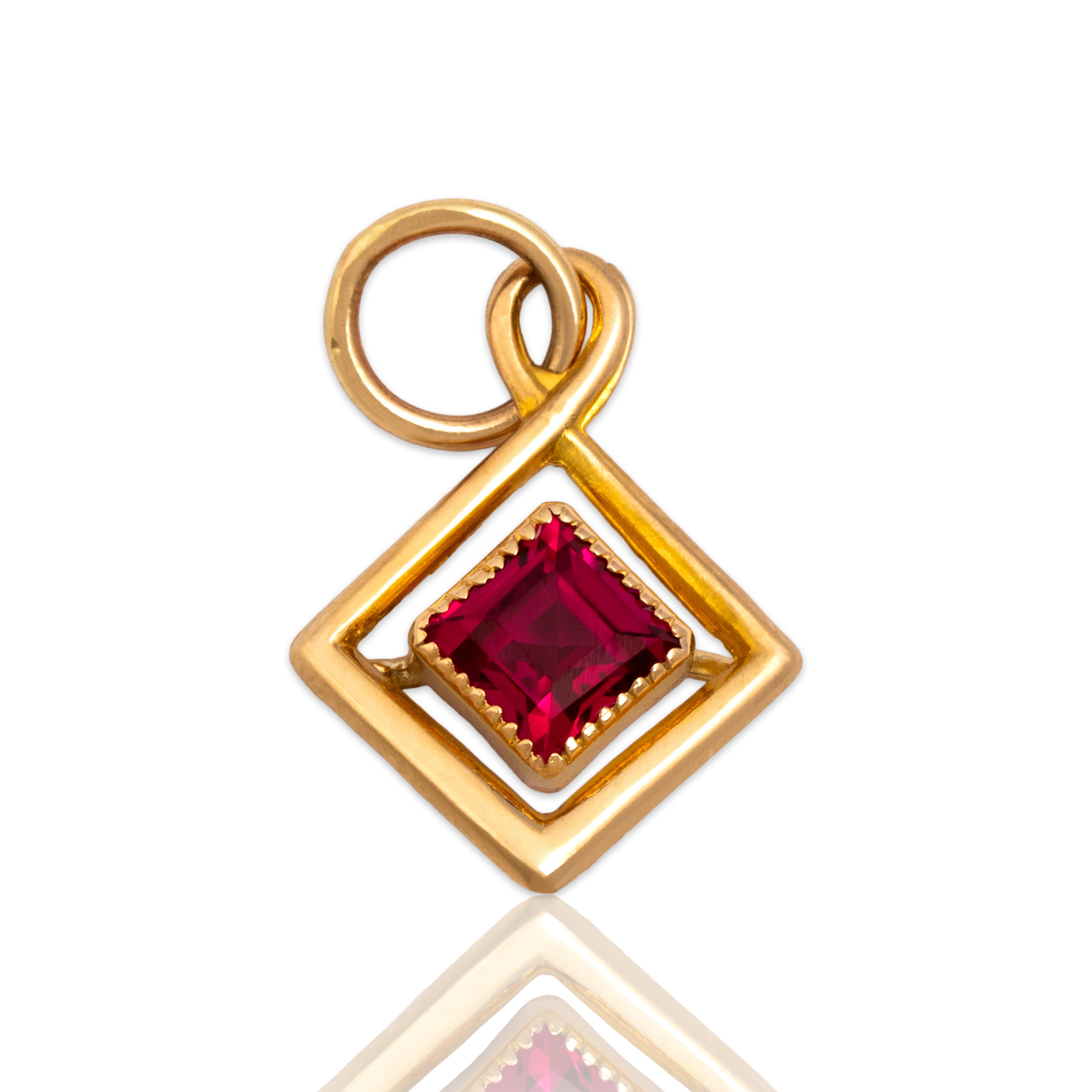 Antique 10k Yellow Gold Synthetic Ruby Crossover Square Charm / Pendant - Close-up view