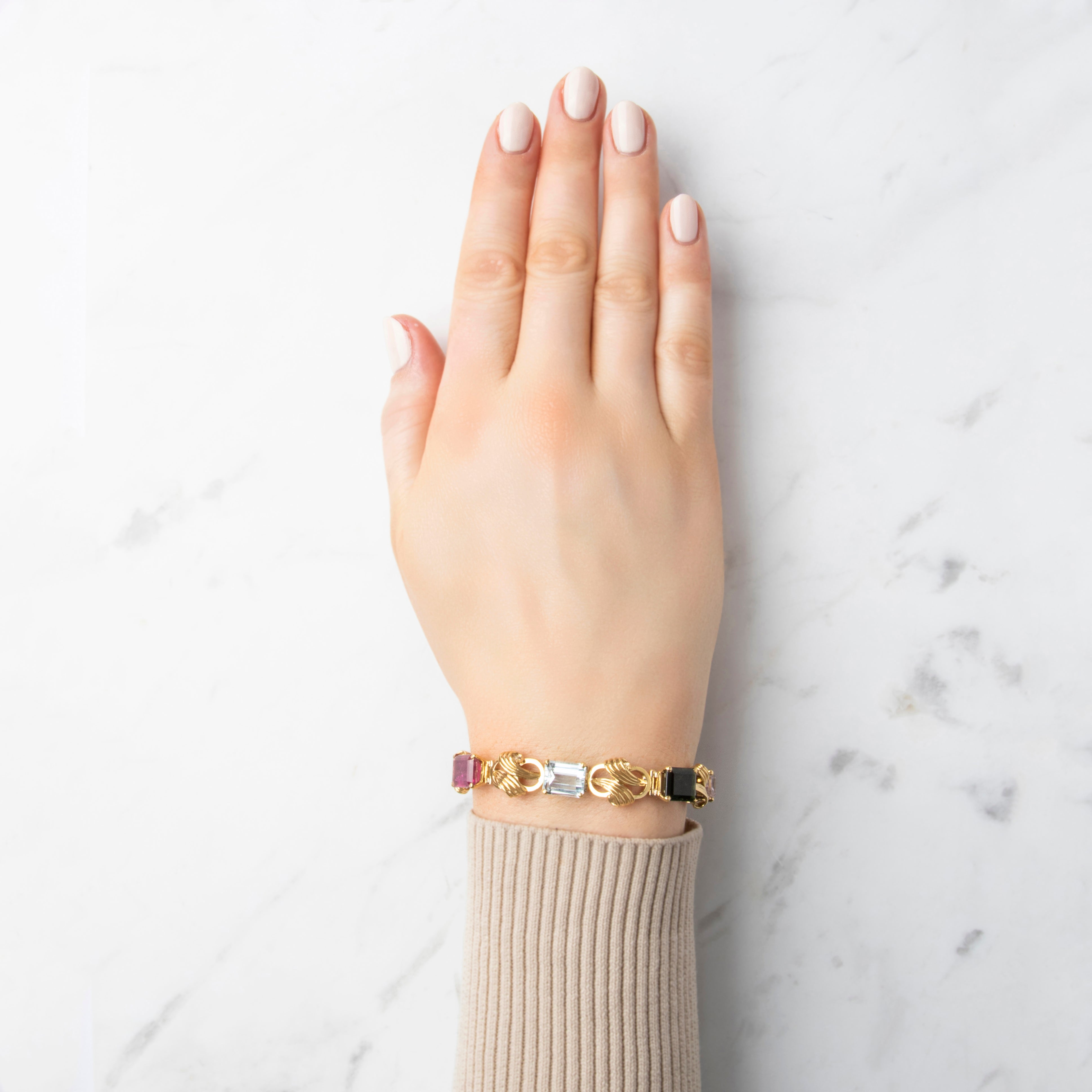 Vintage 18k Yellow Gold 5.75cttw Tourmaline 3.54ct Light Blue Topaz 2.95ct Morganite 2.91ct Smoky Citrine 2.82ct Green Quartz 2.55ct Amethyst Outstanding Scrolling Link Rainbow Bracelet - On model view