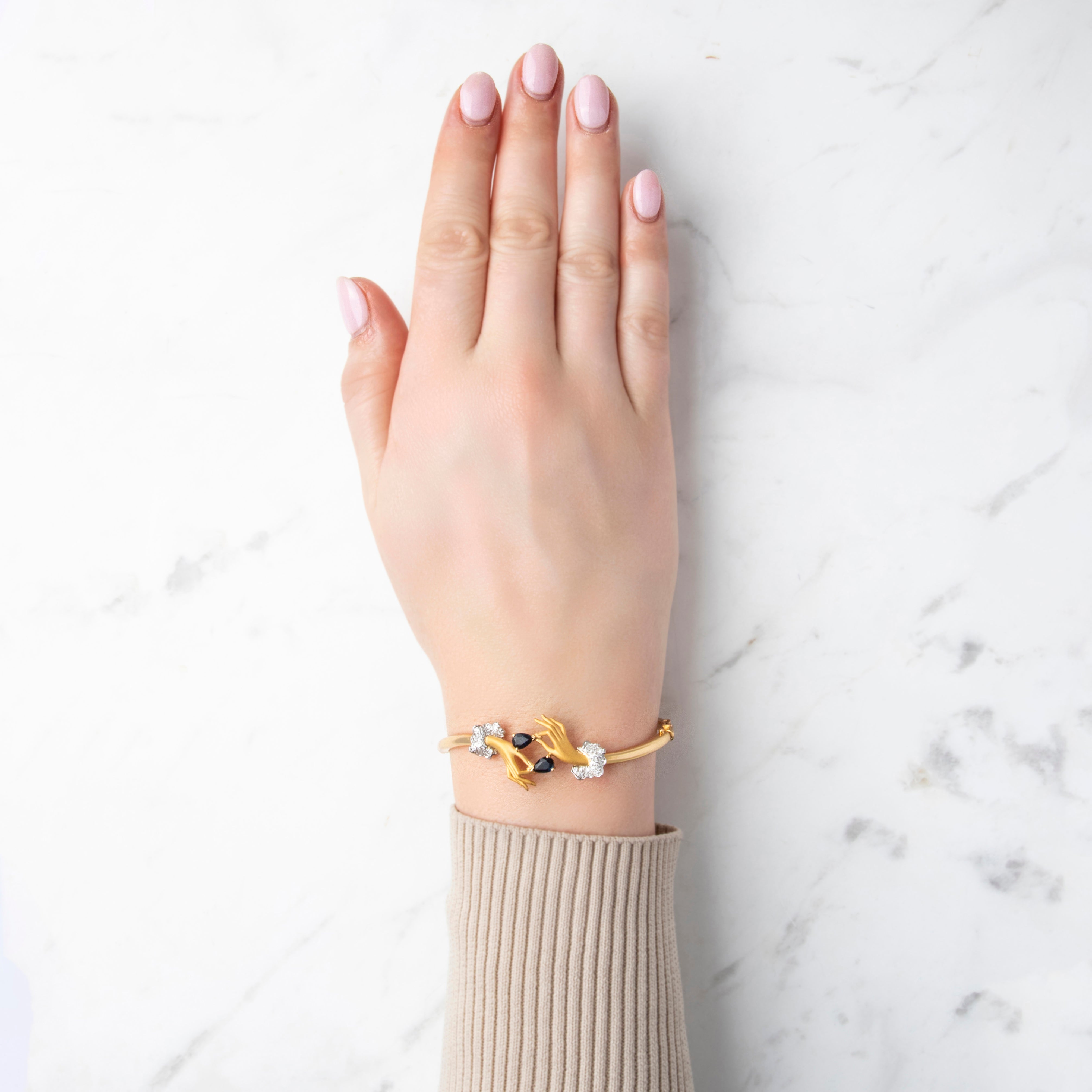 Vintage 18k Yellow & White Gold .8cttw Blue Sapphire Diamond Superb Grasping Hands Bangle Bracelet - On model view