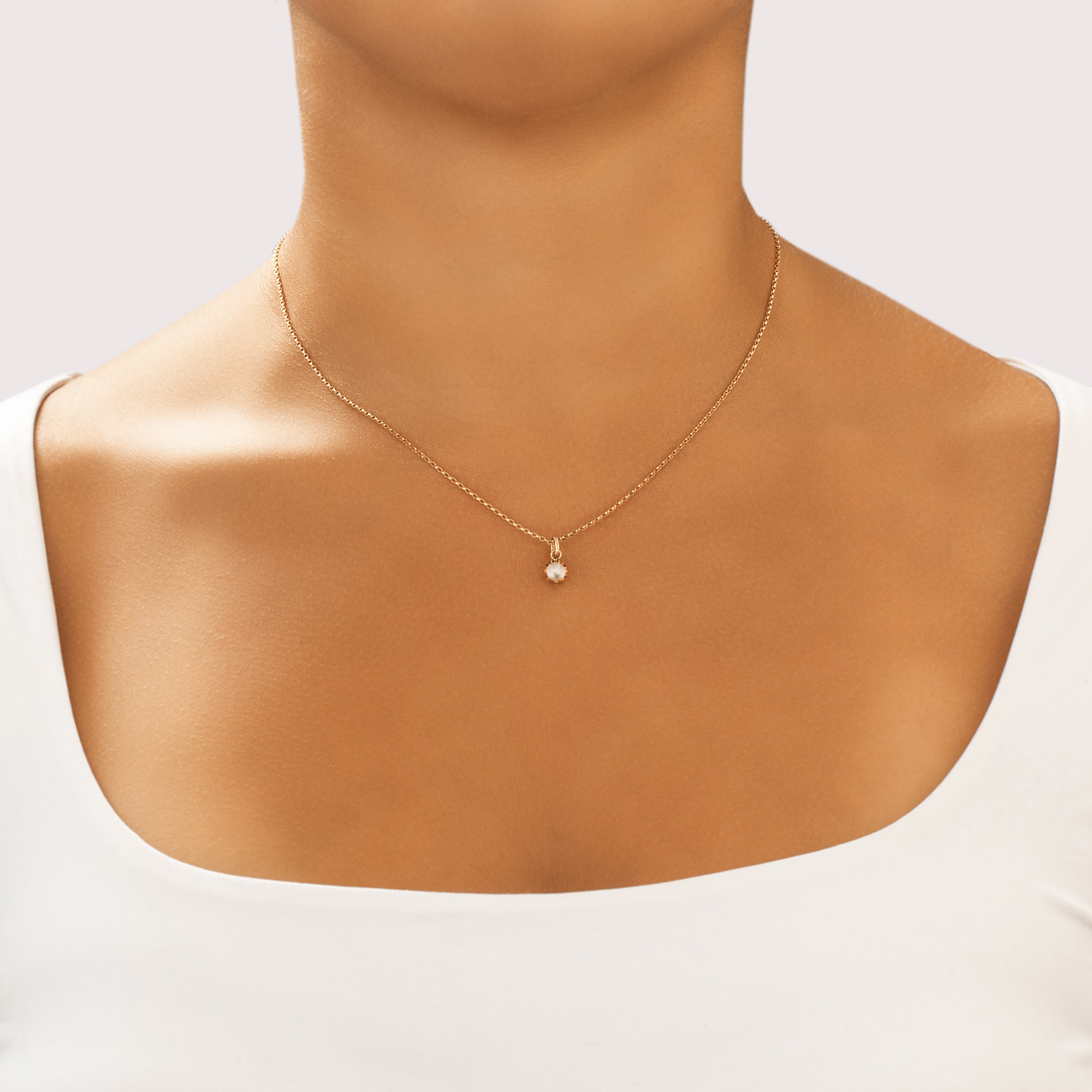 Antique Small 10k Rosy Yellow Gold .7ct Moonstone Glowing Claw-Prong Orb Charm / Pendant - On model view