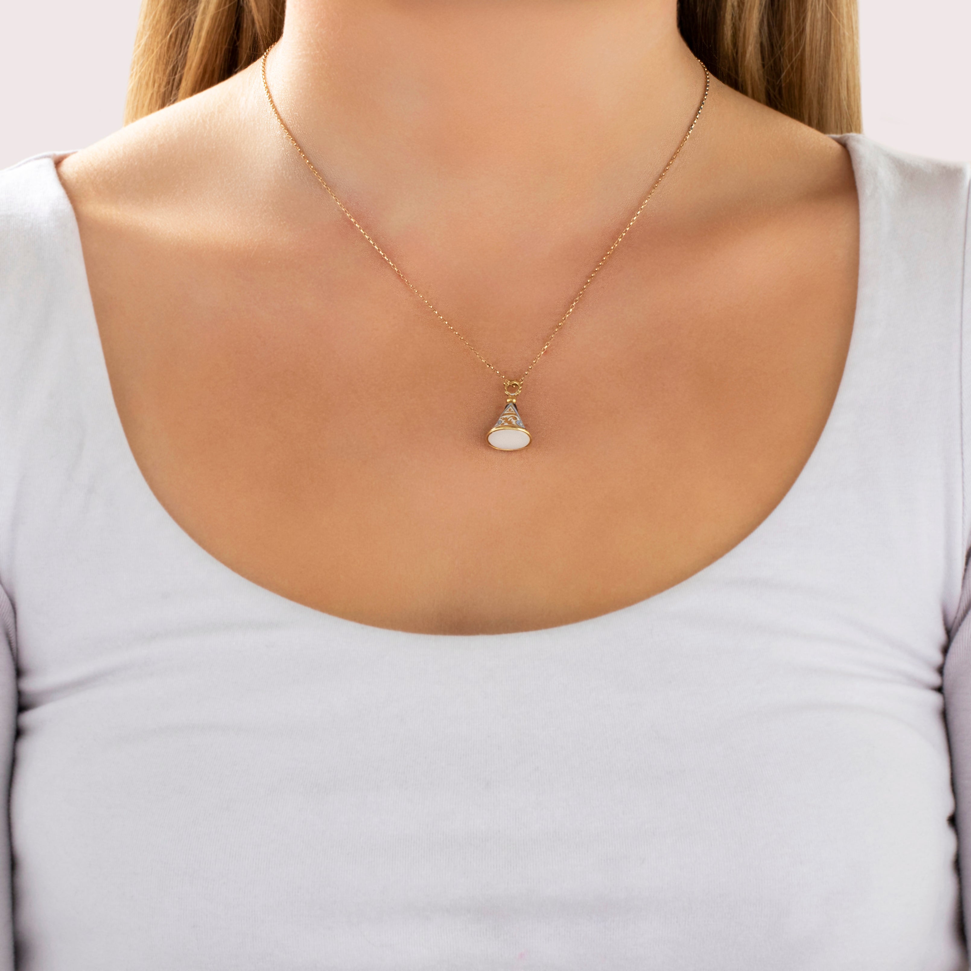 Antique 18k Yellow Gold White Chalcedony Ornate Enamel Watch Fob Pendant - On model view