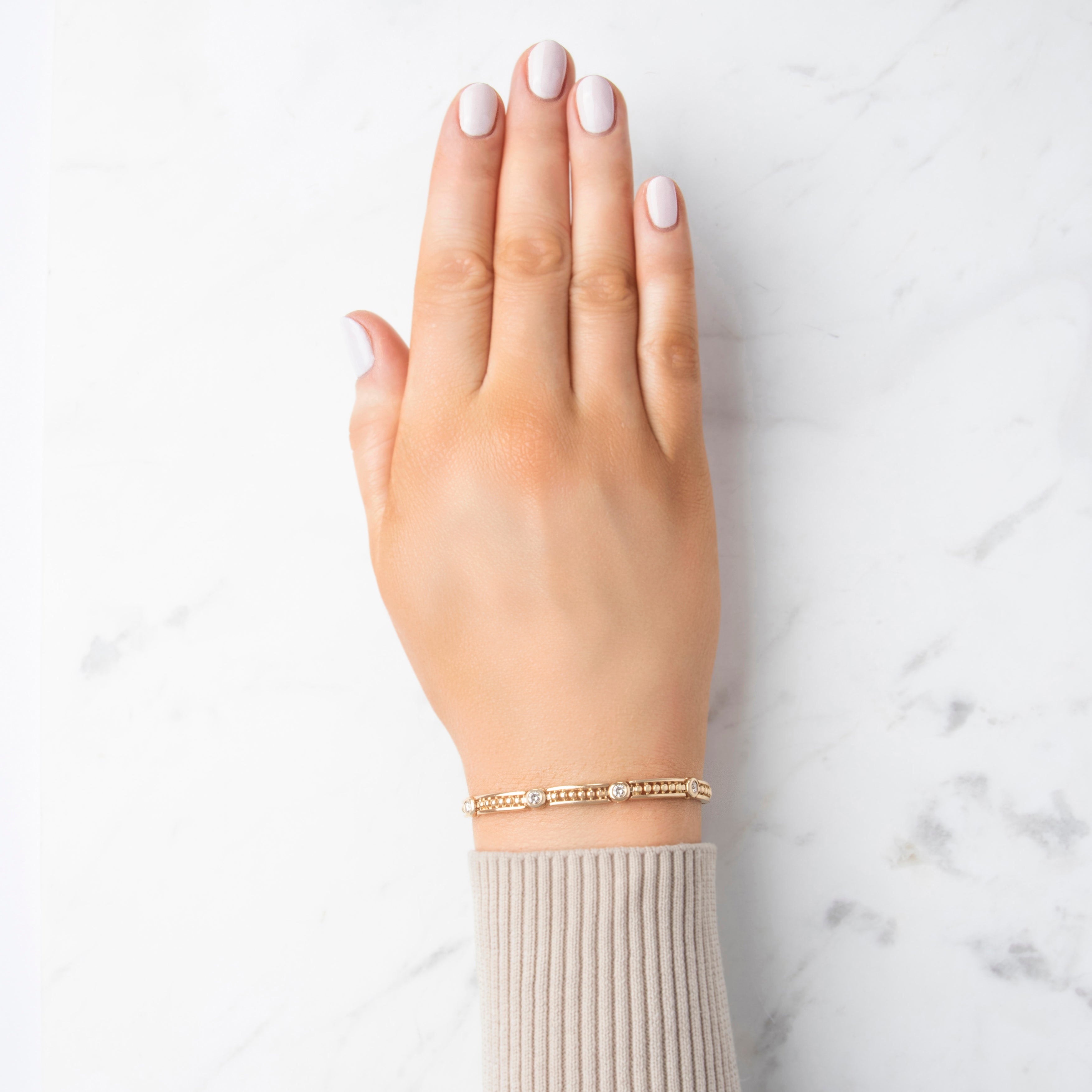 Vintage 14k Yellow Gold 1.04cttw Diamond Dot Detail Station Bracelet - On model view