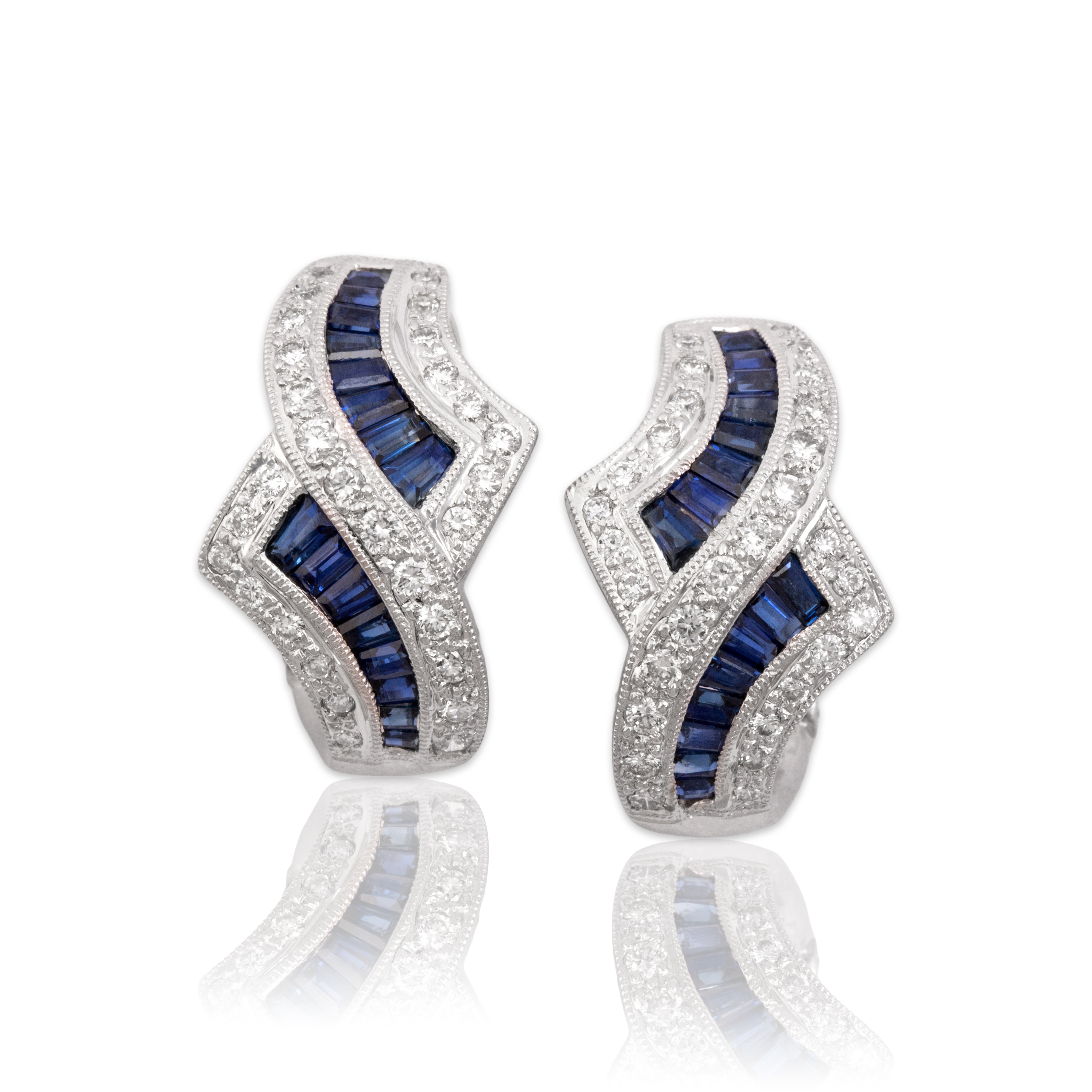 Vintage 18k White Gold 1.11cttw Blue Sapphire Diamond Elegant Sparkling Channel Omega-Back Earrings - Close-up view