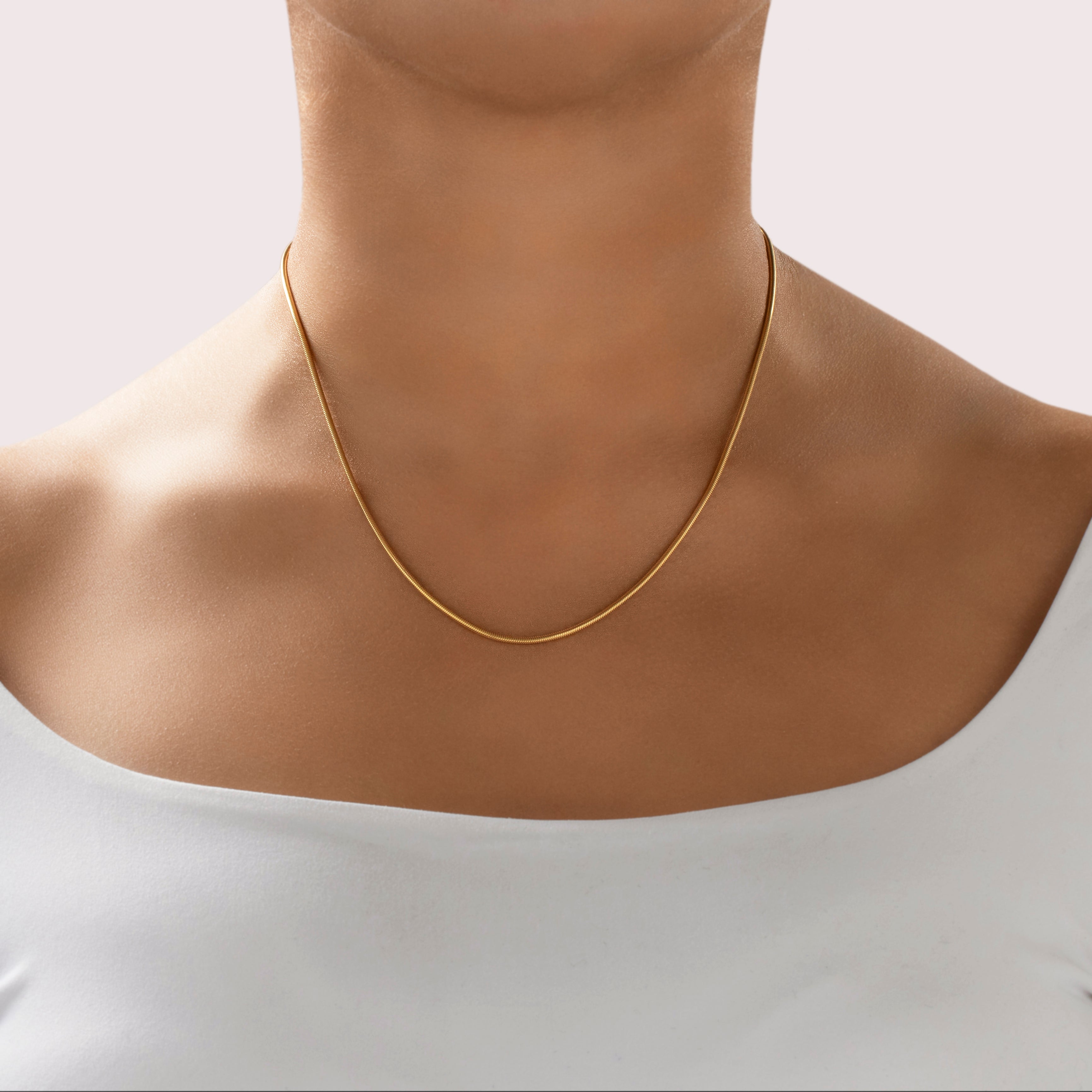 Vintage Italian 1.6mm 14k Yellow Gold Sleek Snake Chain Link Chain - On model view