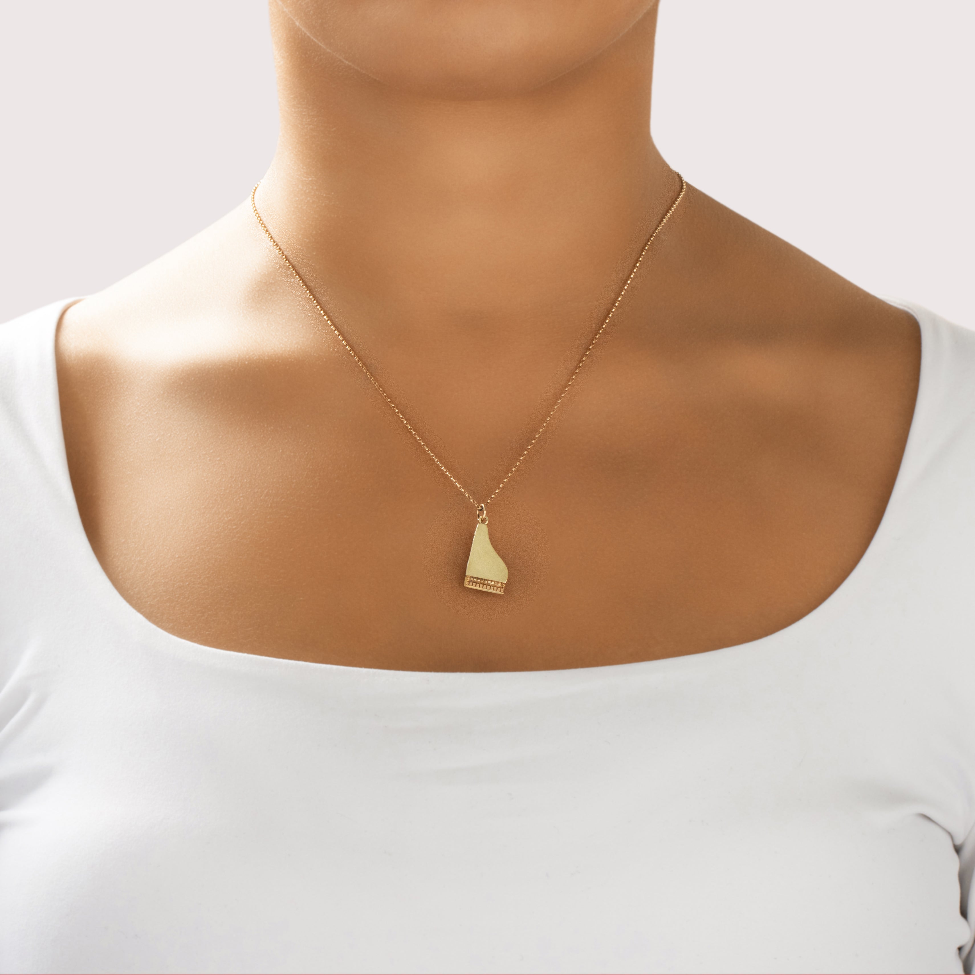 Vintage Austrian 14k Yellow & Rose Gold Musical Articulated Piano Charm / Pendant - On model view