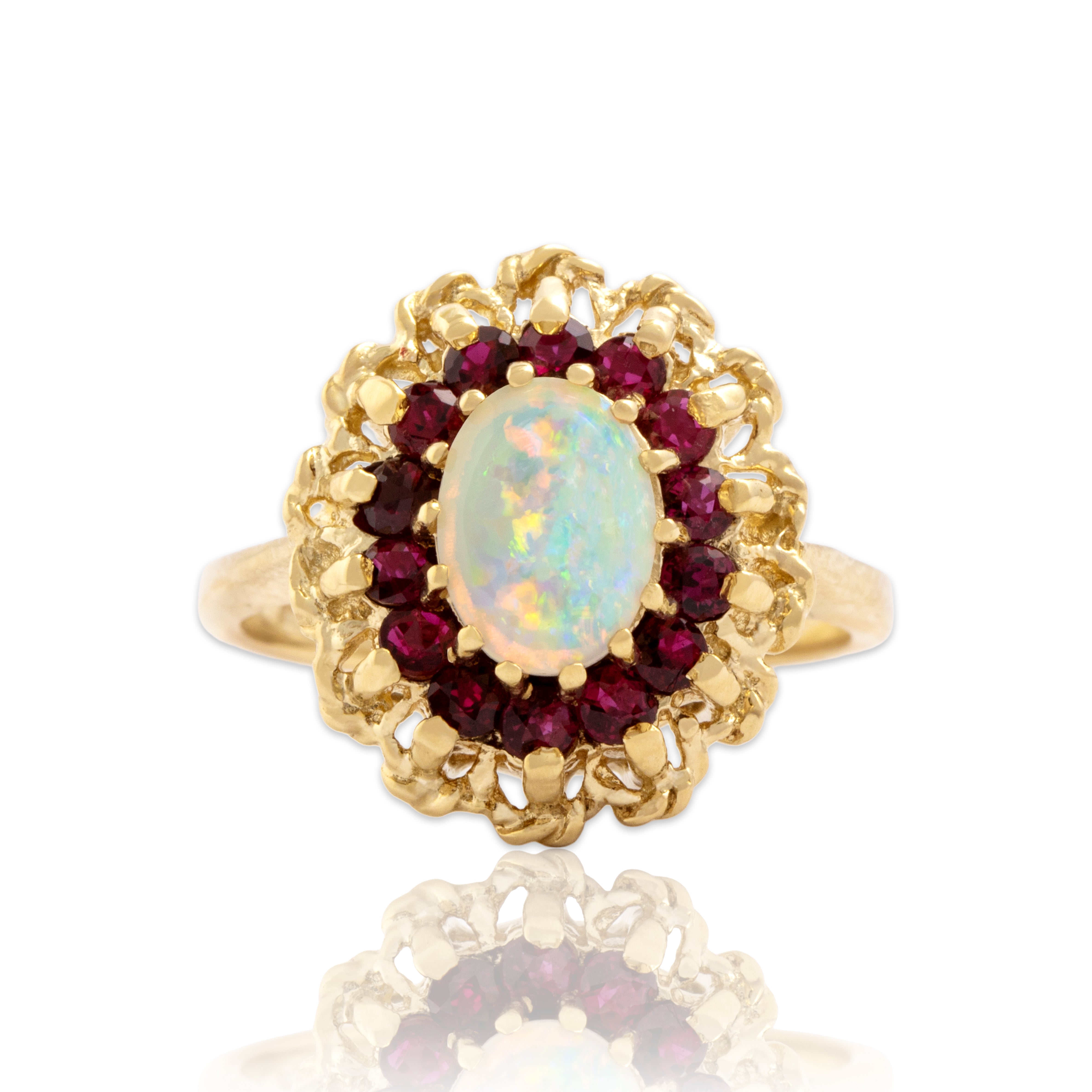 Vintage 14k Yellow Gold Ruby Opal Luminous Oval Halo Ring - Close-up view