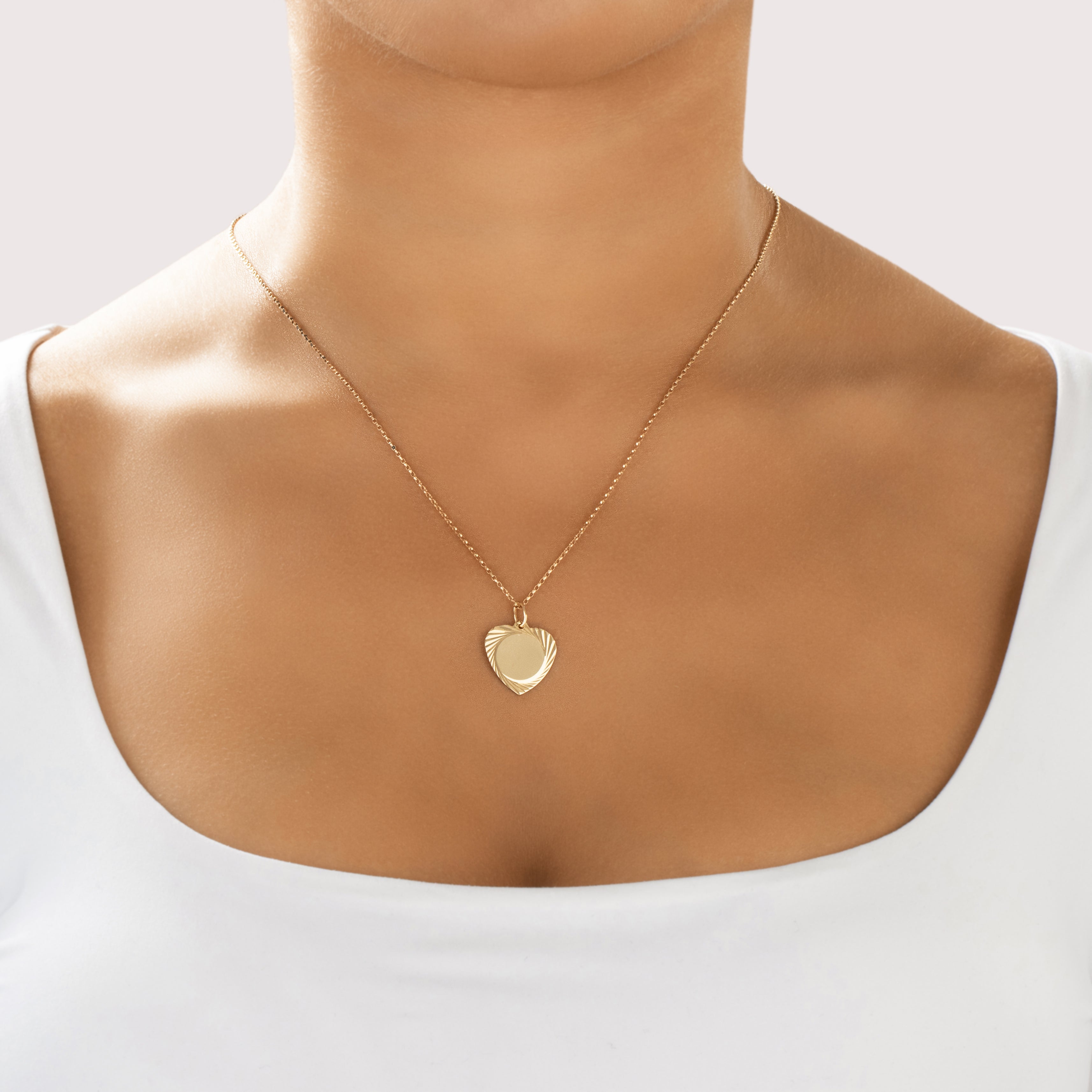 Vintage 14k Yellow Gold Engine-Turned Border Heart Charm / Pendant - On model view