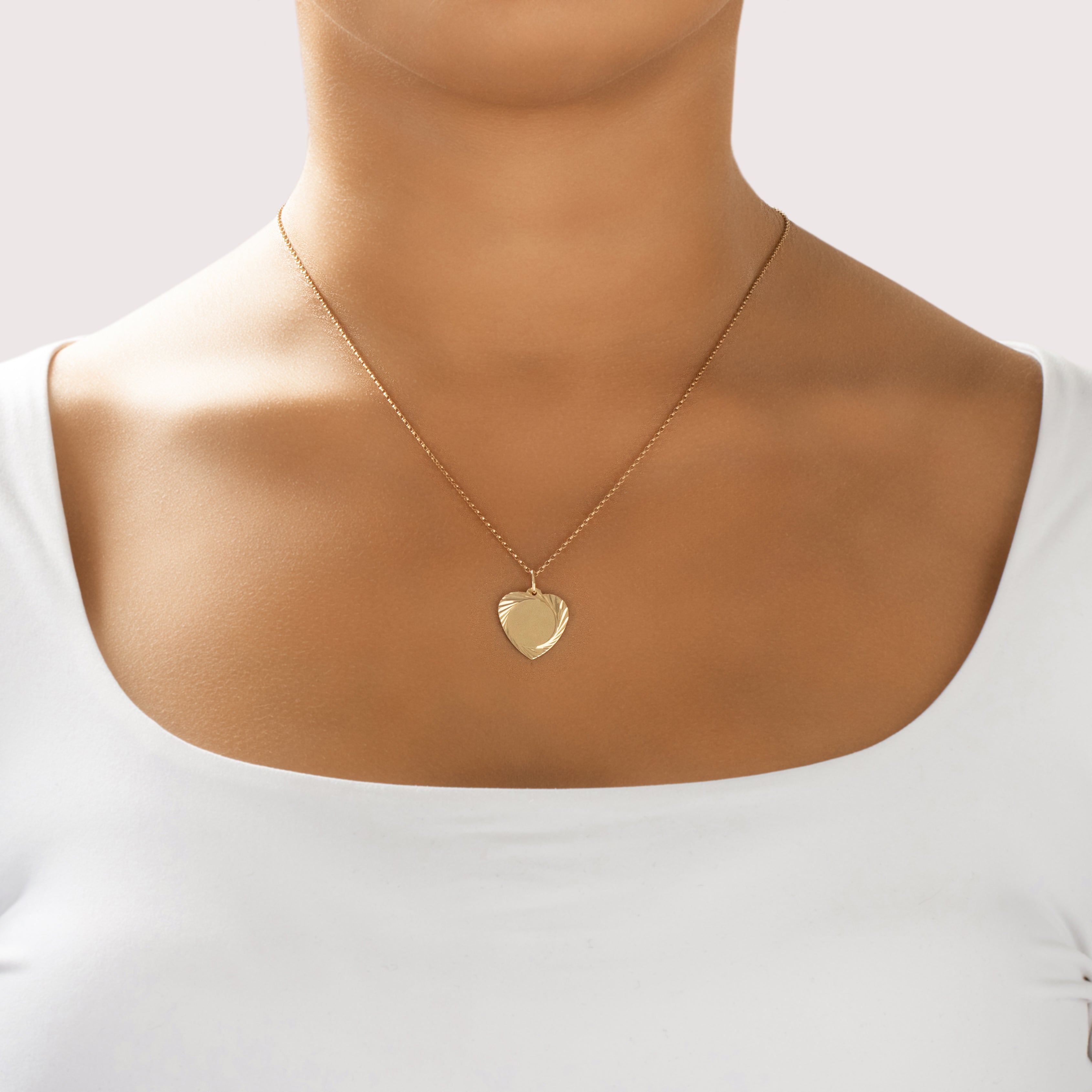 Vintage Lightweight 14k Yellow Gold Gleaming Geometric Heart Charm / Pendant - On model view