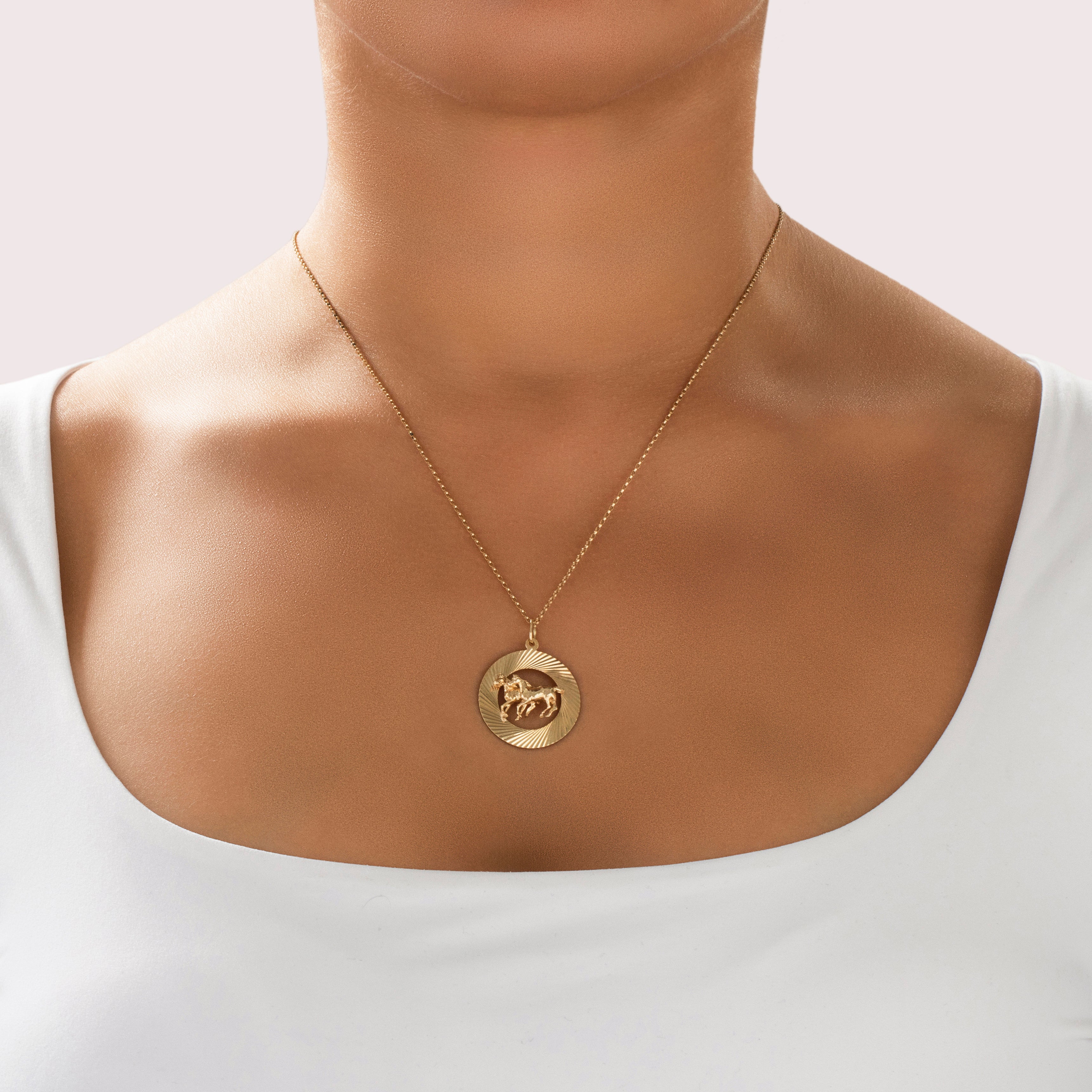 Vintage 14k Yellow Gold Galloping Horses Pendant - On model view