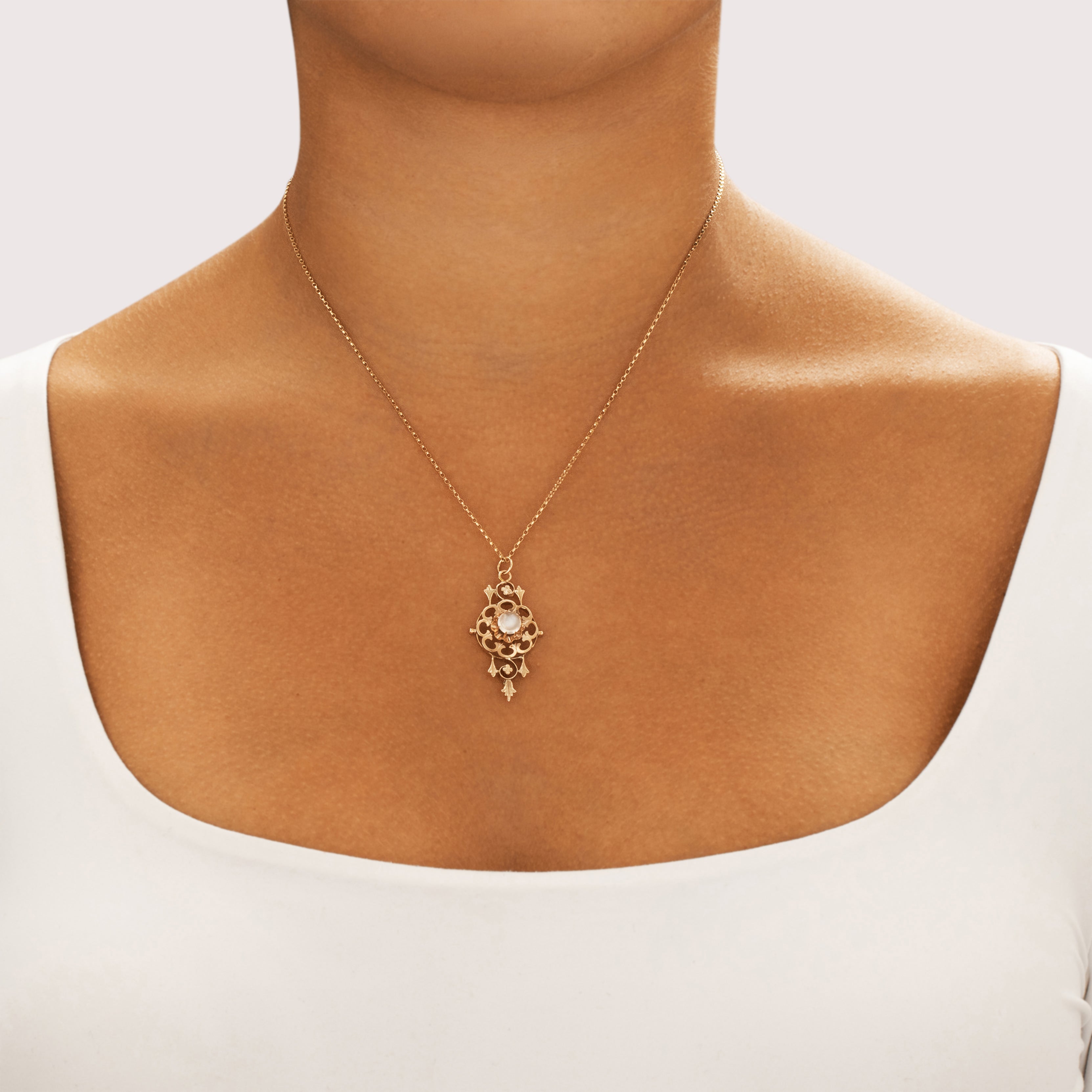 Antique 10k Rosy Yellow Gold .87ct Moonstone Gleaming Ornate Buttercup-Set Pendant
