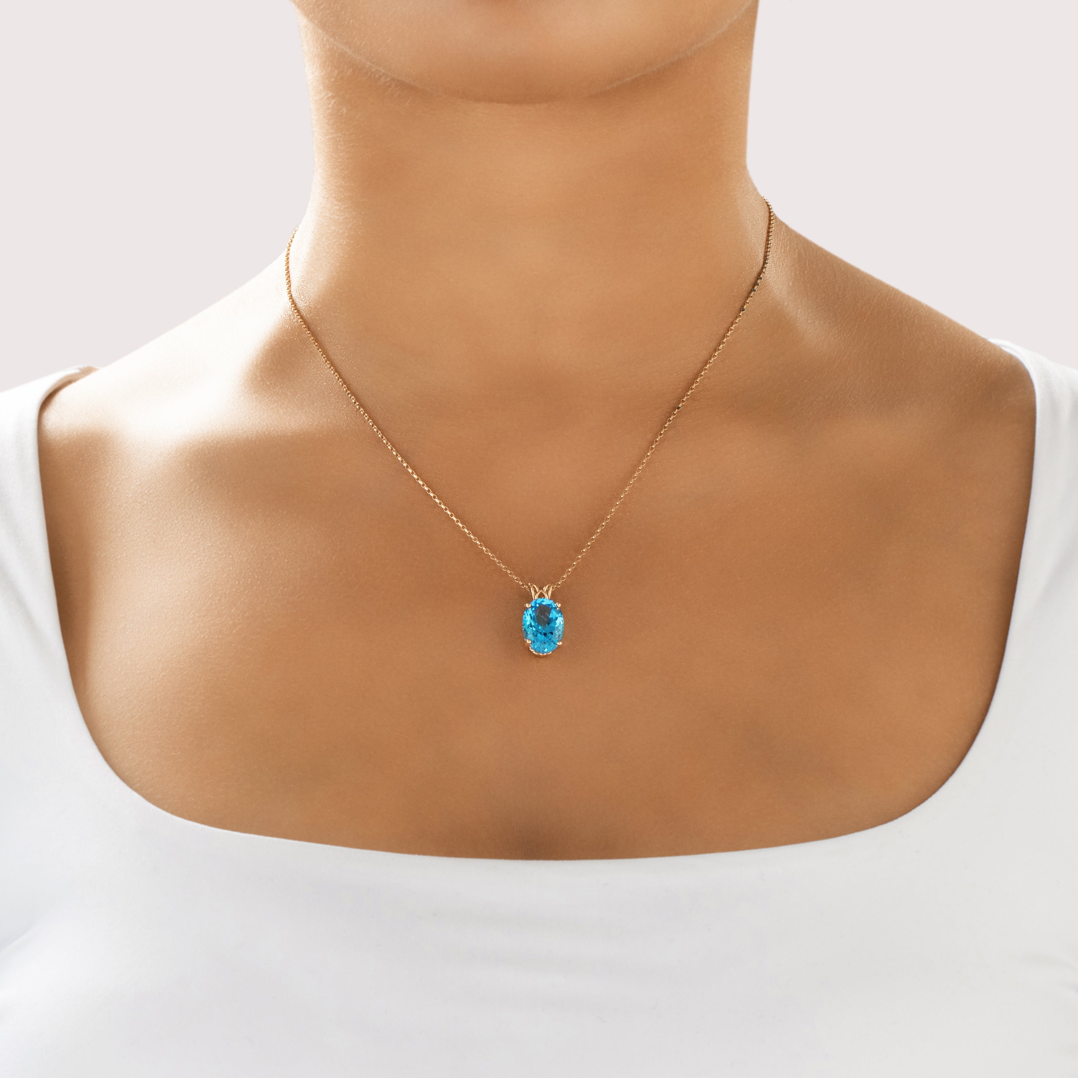 Vintage 14k Yellow Gold 7.5ct Blue Topaz Vivid Oval Solitaire Ornate Setting Pendant - On model view