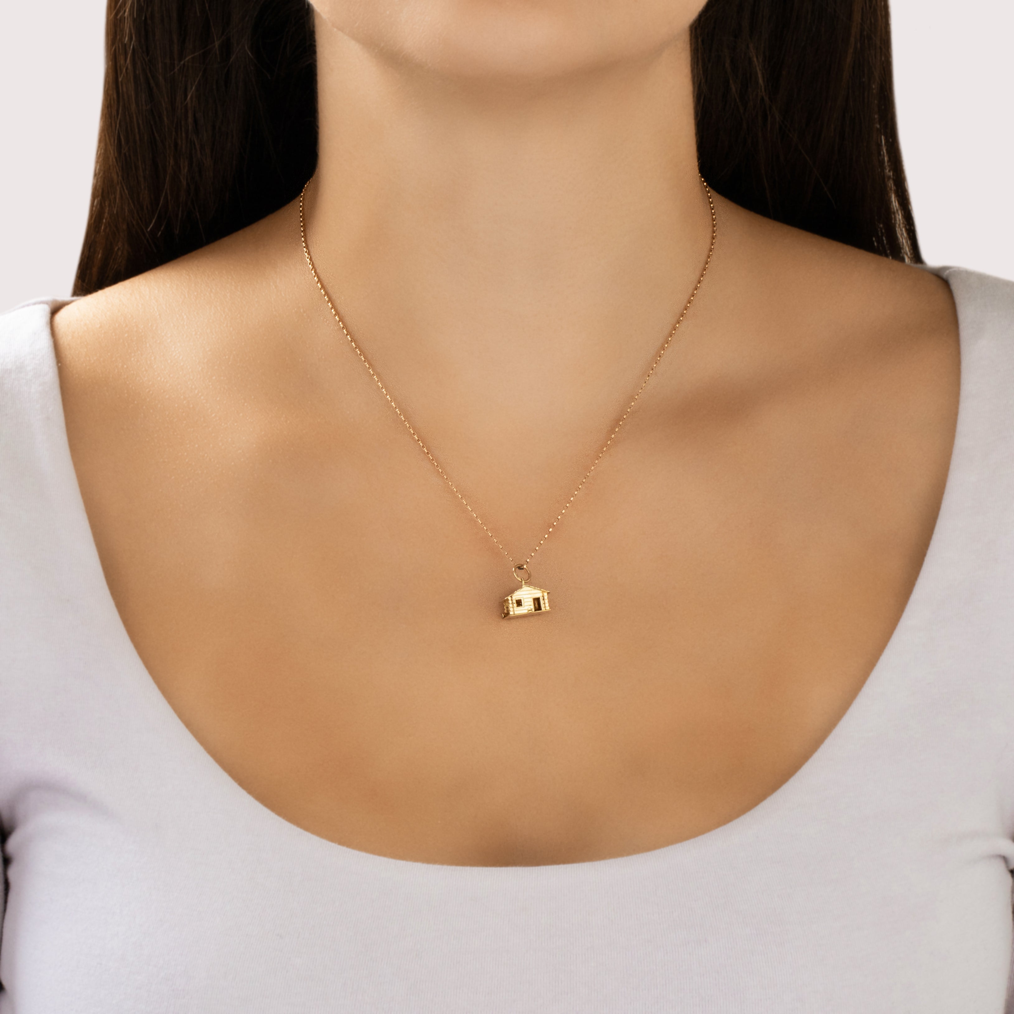 Vintage Swiss 14k Yellow Gold Adorable Articulating Log Cabin Charm / Pendant - On model view