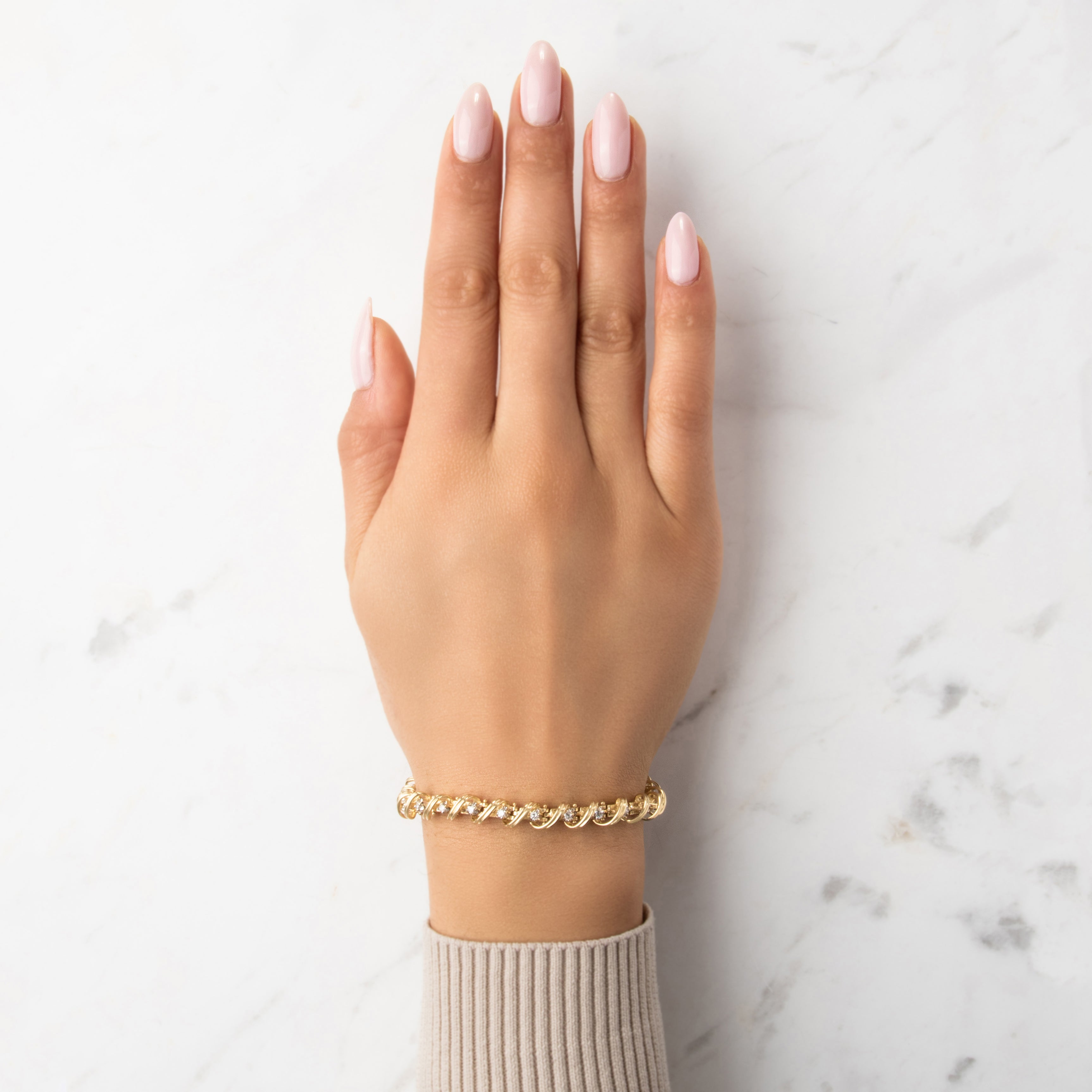 Vintage Heavy 14k Yellow Gold .8cttw Diamond Sculptural Wrapped Spiral Link Tennis Bracelet - On model view