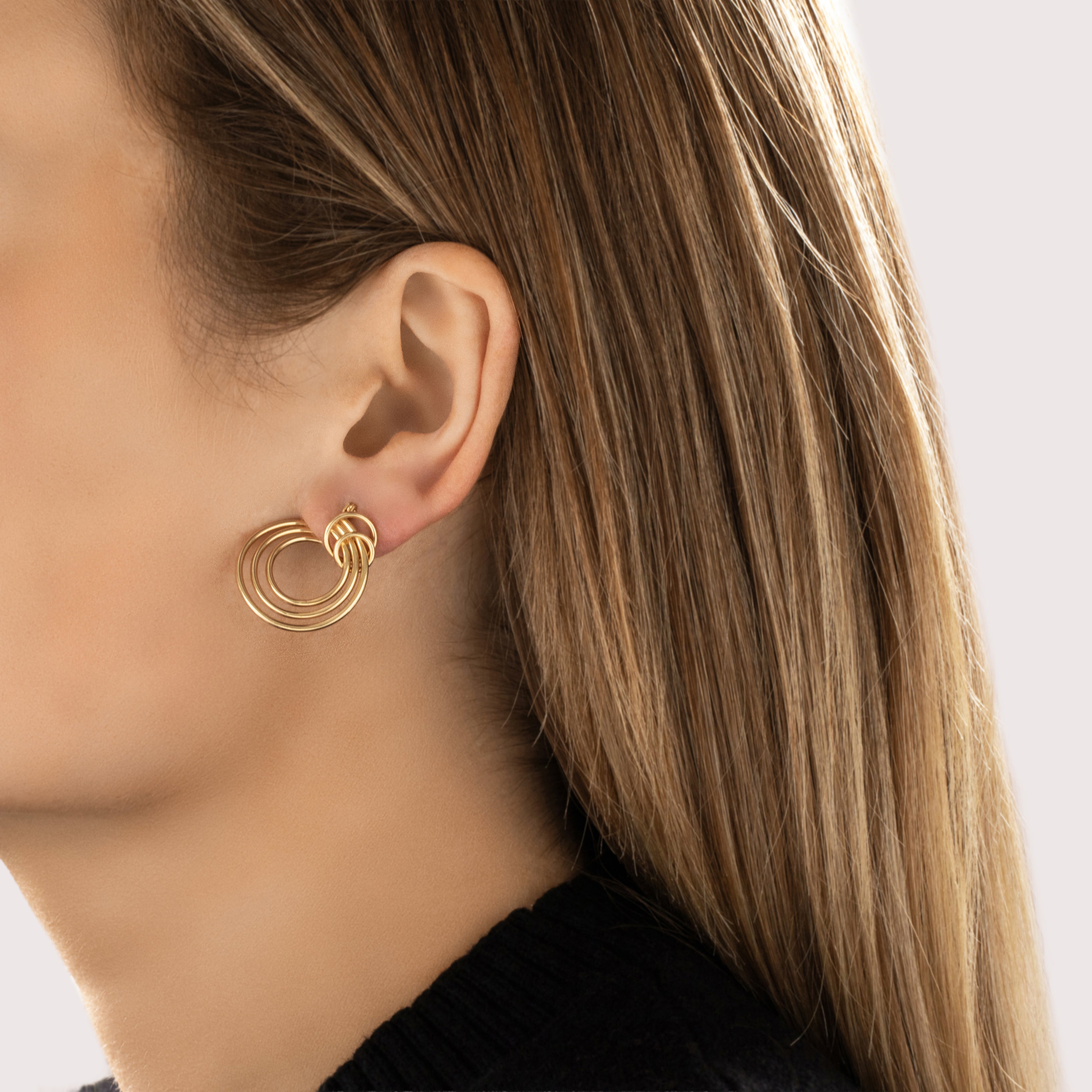 Vintage 14k Yellow Gold Sculptural Swirling Hoop Earrings - On model view