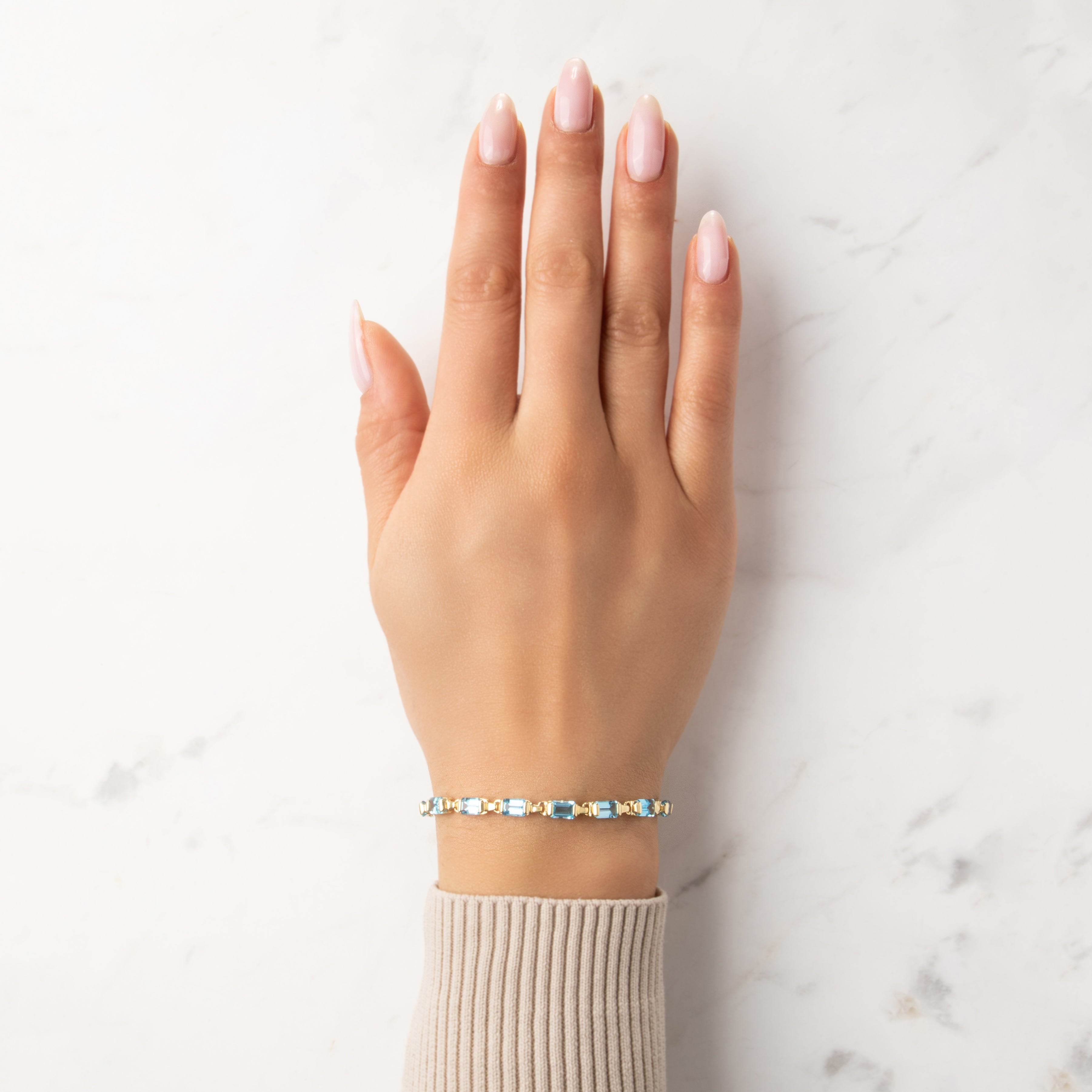 Vintage 14k Yellow Gold 9.69cttw Blue Topaz Refined Emerald-Cut Link Bracelet - On model view