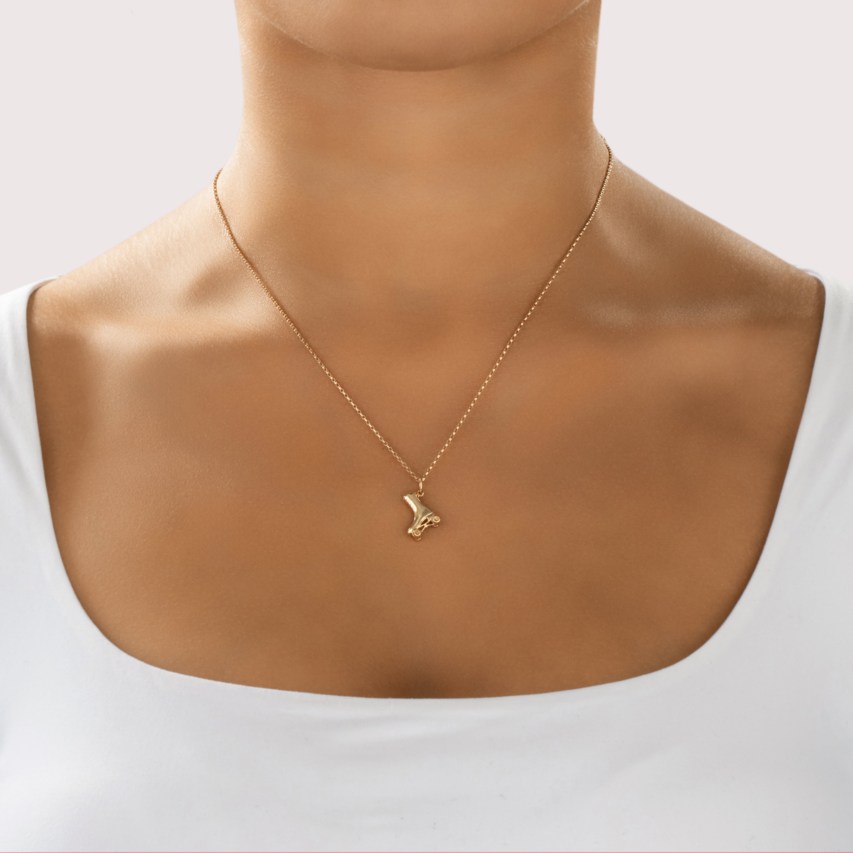 Vintage 14k Yellow Gold Playful Articulated Roller Skate Charm / Pendant - On model view