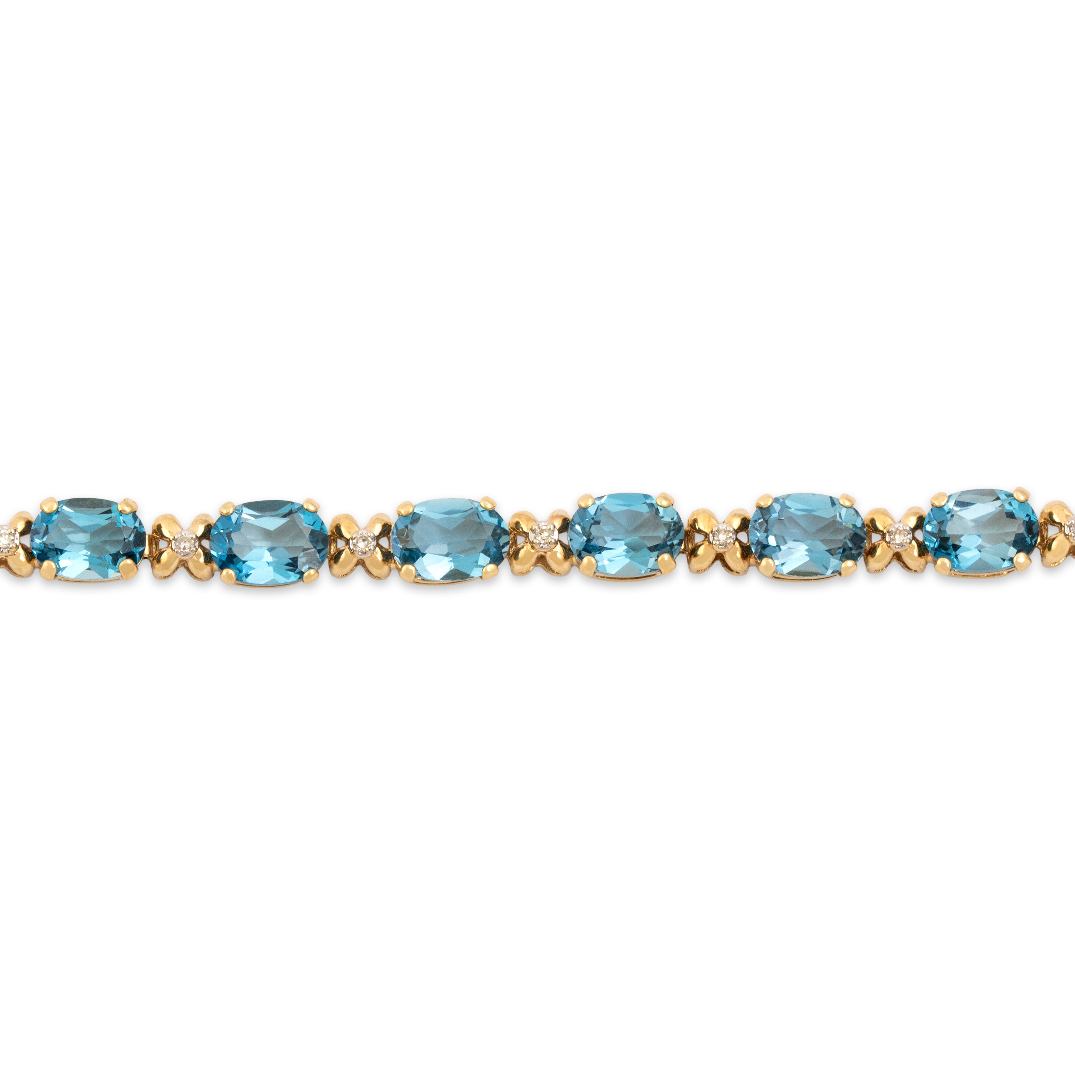 Vintage 14k Yellow Gold 13.94cttw Blue Topaz Diamond Sparkling Oval Station Bracelet - Close-up view