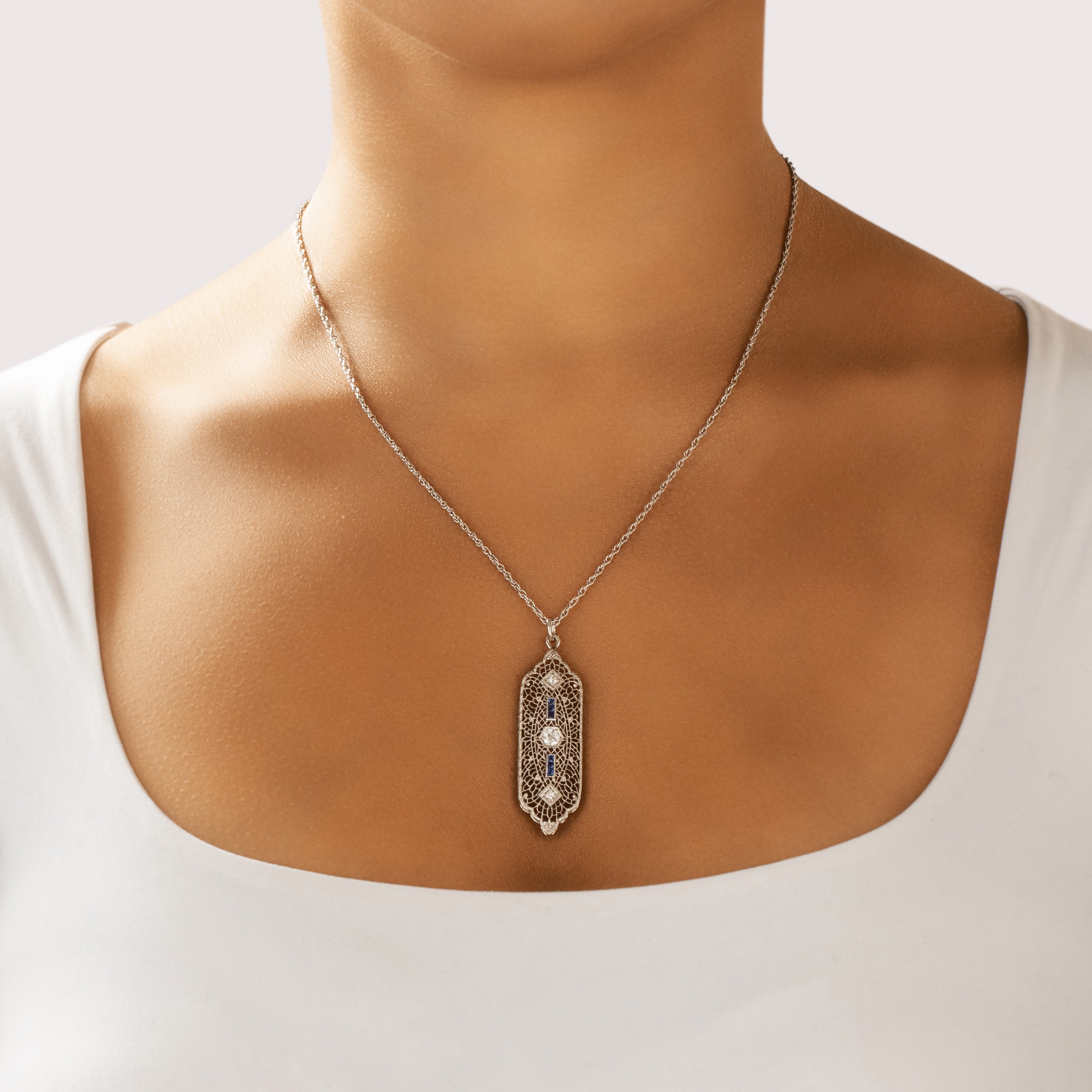 Antique Art Deco 14k White Gold Old European Cut Diamond Blue Sapphire Delicate Milgrain Openwork Pendant - On model view