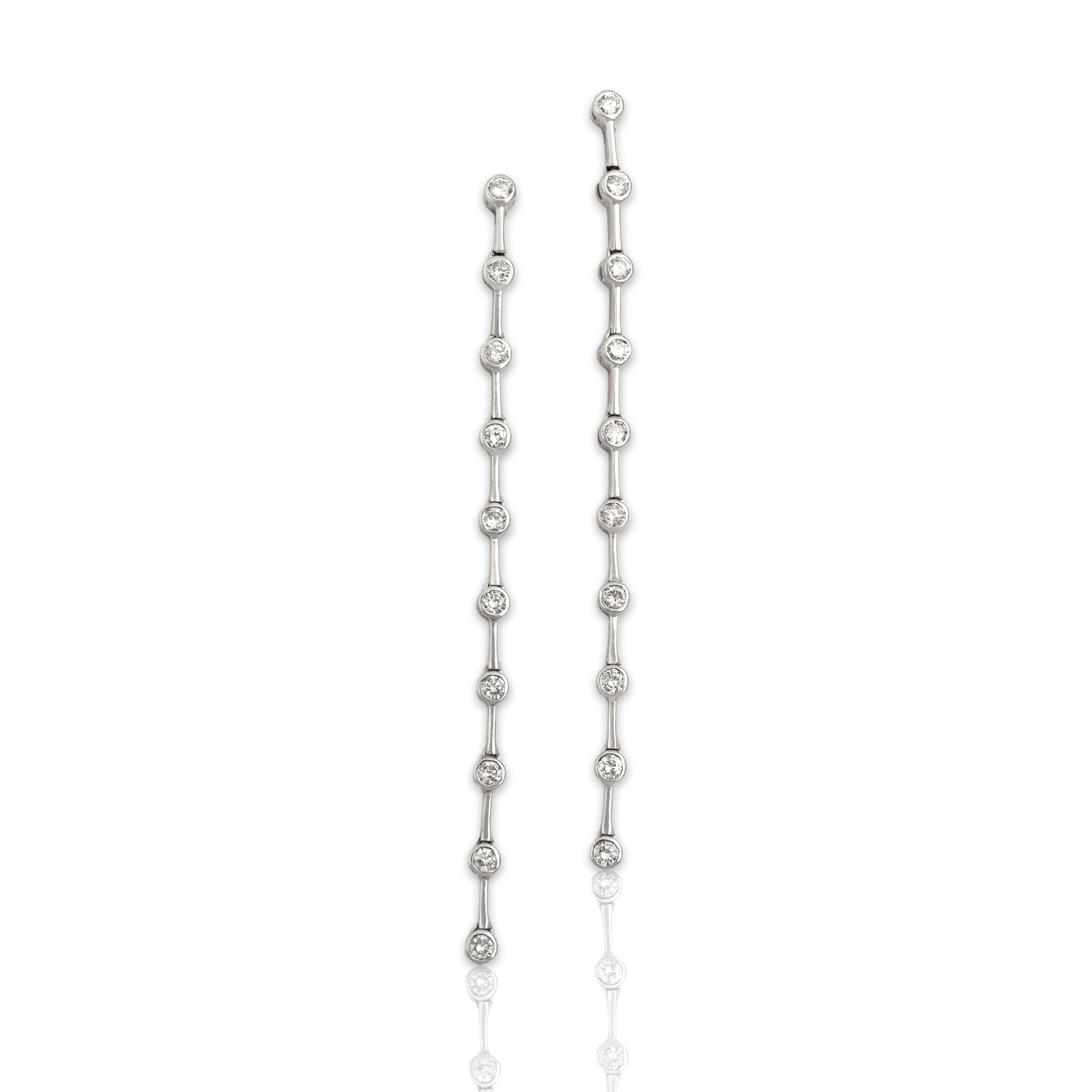 Vintage 14k White Gold 1.14cttw Diamond Brilliant Cascading Dangle Earrings - Close-up view