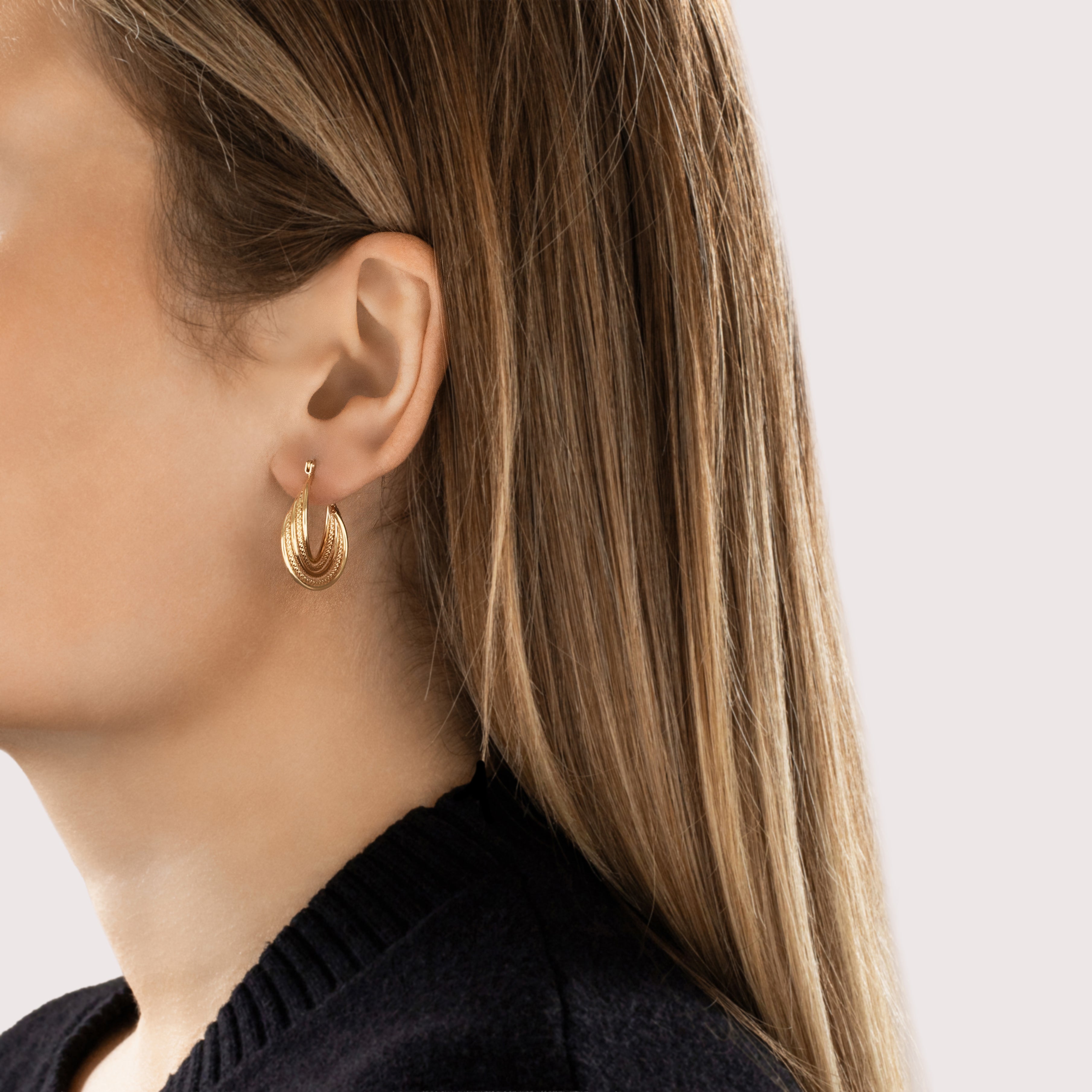 Vintage 14k Yellow Gold Twisted Textured Open Ribbon Hoop Earrings - On model view