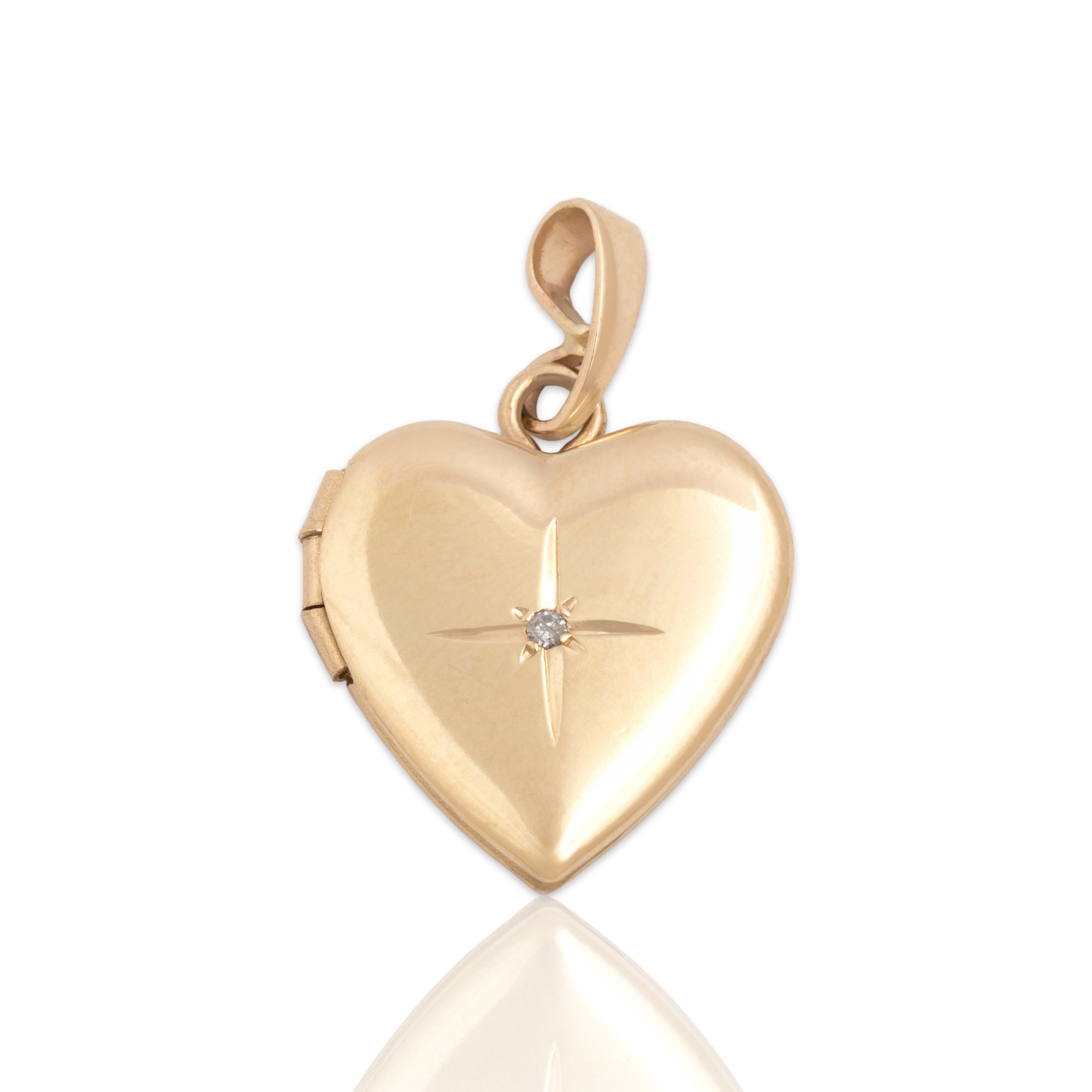 Vintage 14k Yellow Gold Diamond Dainty Star-Set Heart Locket Charm / Pendant - Close-up view